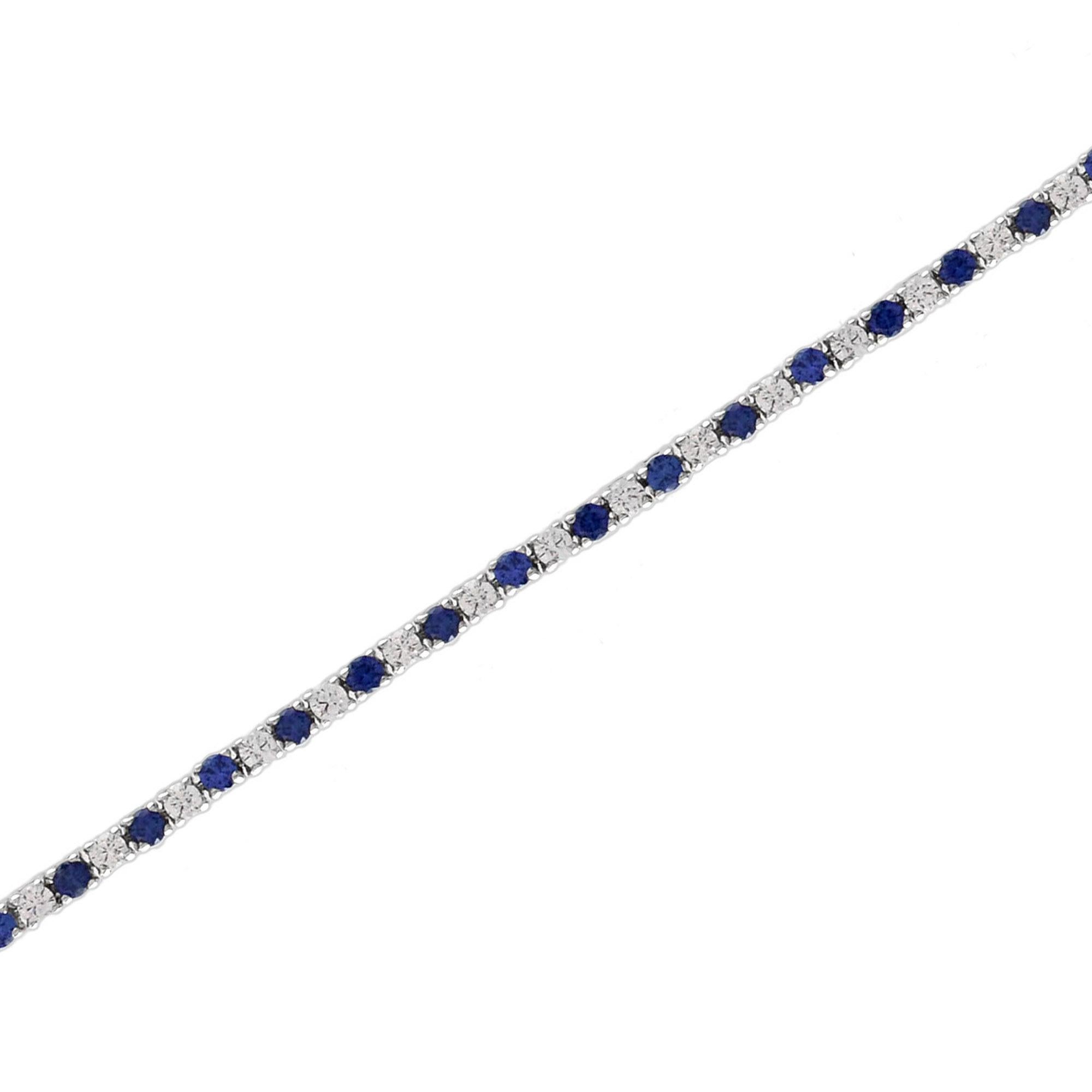 Luxuriant and colorful, this Aimée bracelet features alternating round natural blue sapphire and round brilliant-cut diamonds. gold lends security to the classic Art-Deco style and a box clasp with hidden safety keeps this stunner secure. 14K White