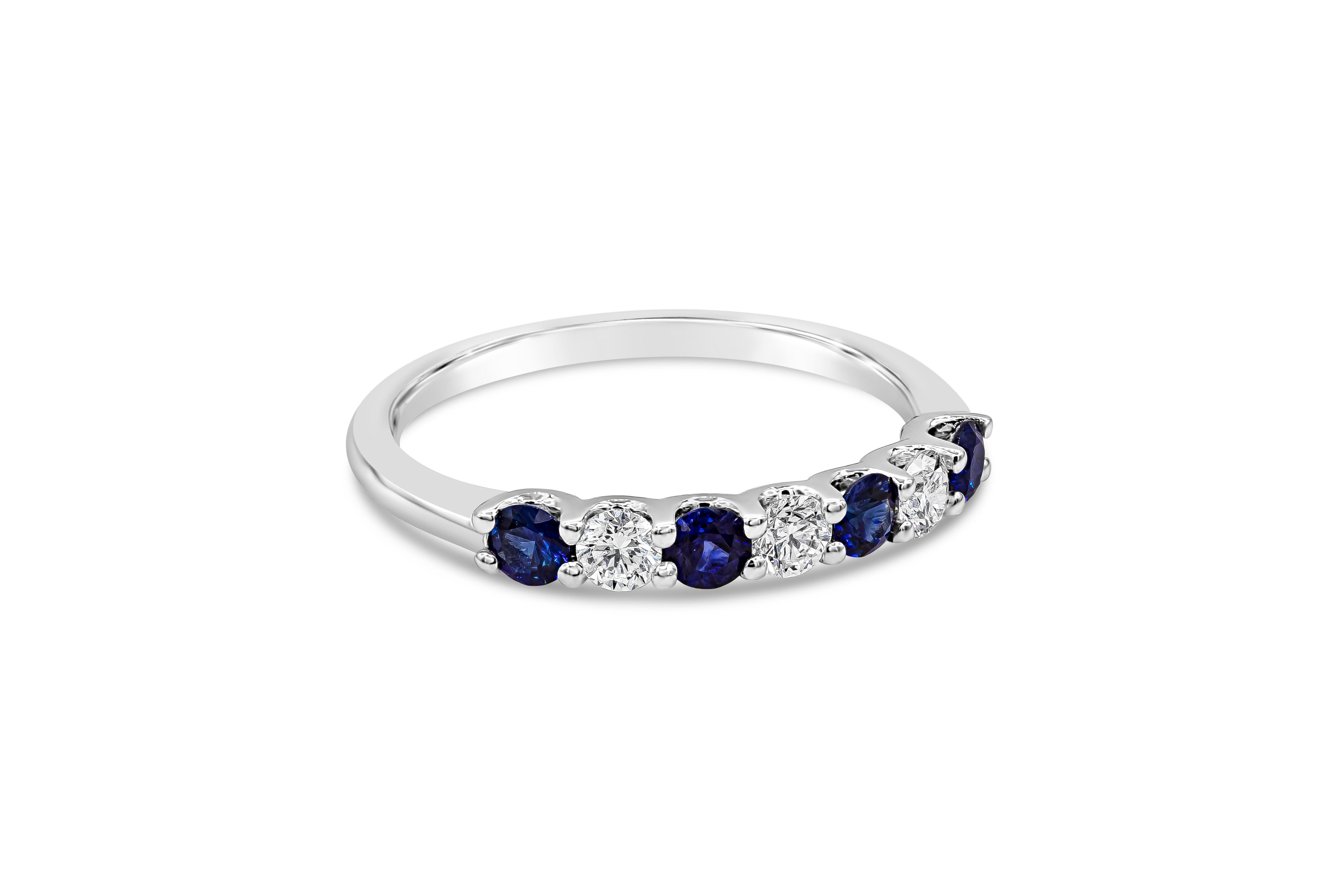 Features beautiful round cut blue sapphires alternating with round brilliant diamonds. Set in 18k white gold. Blue sapphires weigh 0.41 carats; diamonds weigh 0.27 carats total. Size 6.5 US.

Style available in different price ranges. Prices are