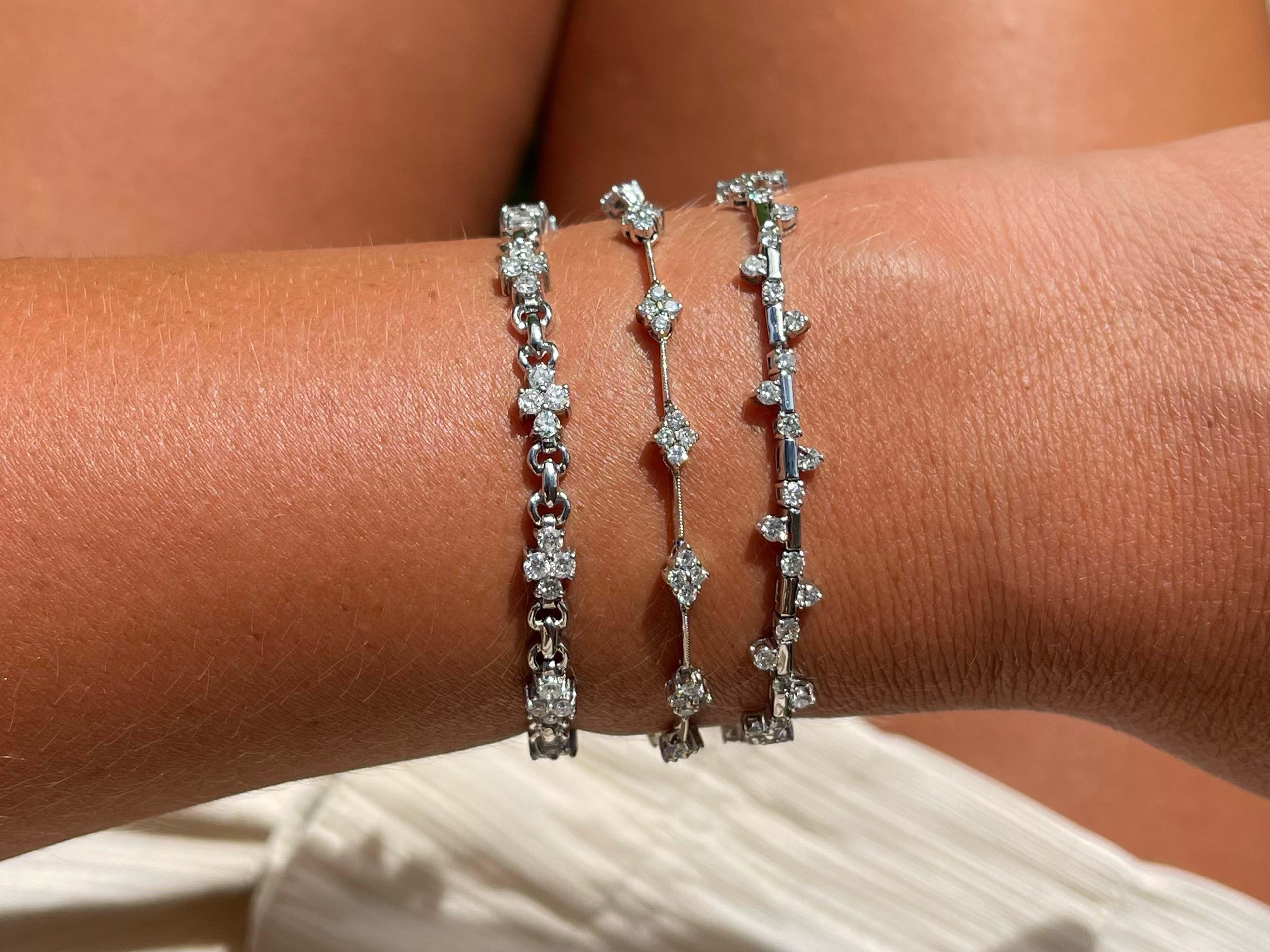 Bracelet Specifications:

Metal: 14k White Gold

Diamond Count: 53

Diamond Carat Weight: 2.6

Diamond Color: H-I

Diamond Clarity: SI

Bracelet Length: ~7.10 inches

Bracelet Width: ~ 6 mm

Total Weight: 9.2 Grams

Condition: Vintage,