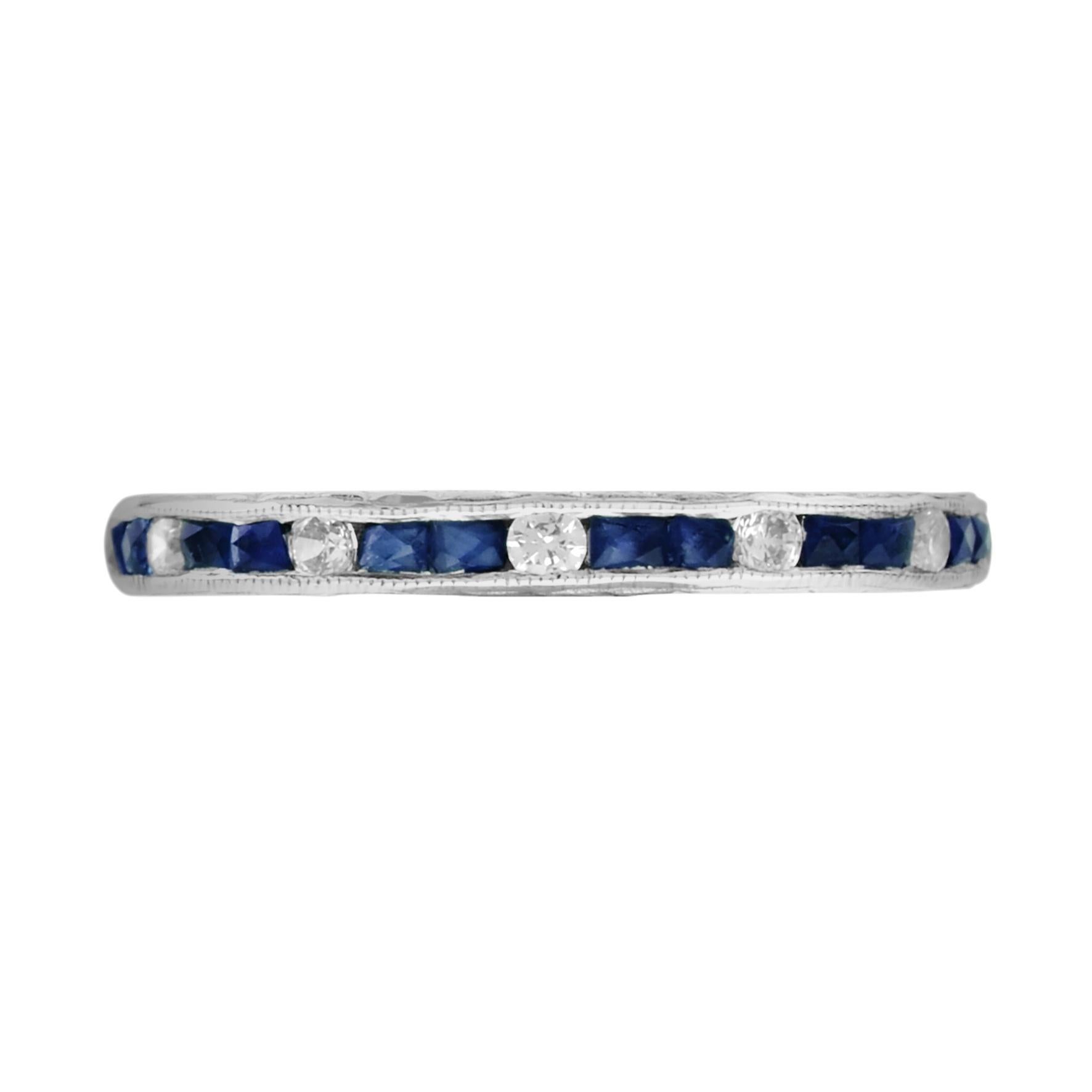 Here is a very lovely sapphire and diamond eternity ring with an Art Deco period design. Hand-made and is set with 24 square cut natural sapphires and 12 round diamonds. 14K White Gold. 
Ring Information
Style: Art Deco
Weight: 2.25 g. (approx. in