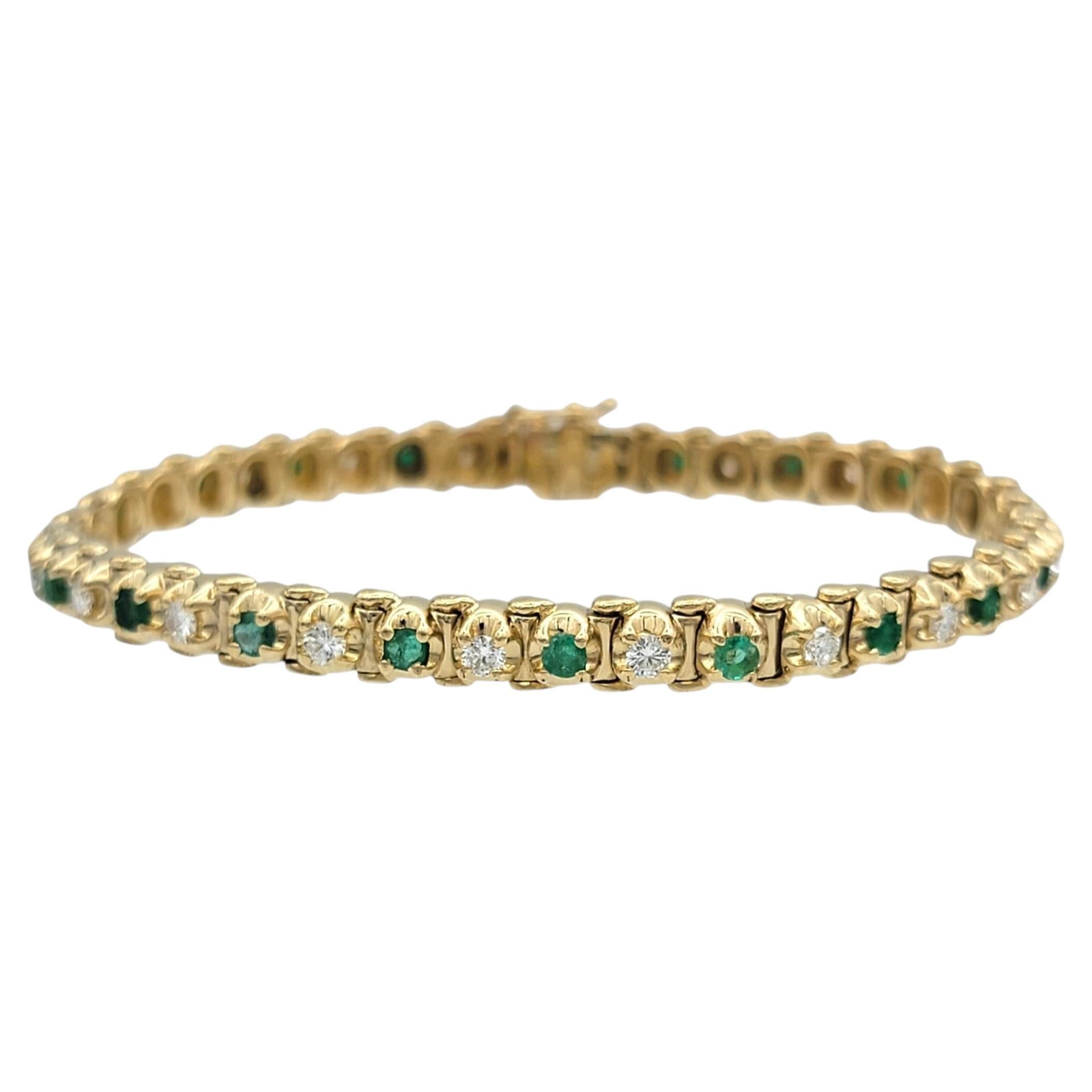 Armband mit abwechselnden Smaragd- und Diamantreihen aus 14-karätigem Gelbgold