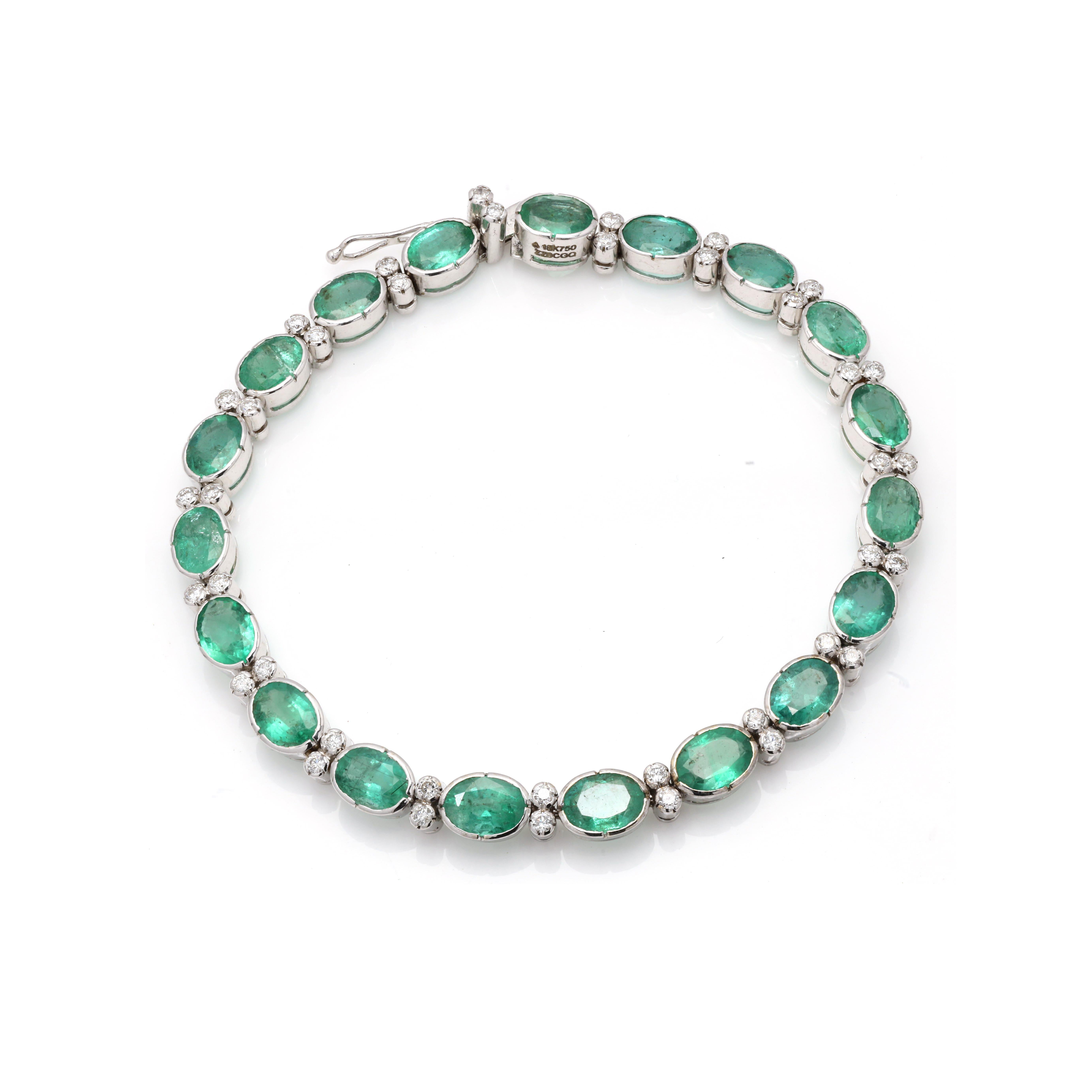 14.15 ct Emerald Diamond Tennis Bracelet in 18K Gold. It has a perfect oval cut gemstone to make you stand out on any occasion or an event.
Emerald invites abundance, love and luck into your life. 
Featuring 14.15 cts of emerald gemstone with