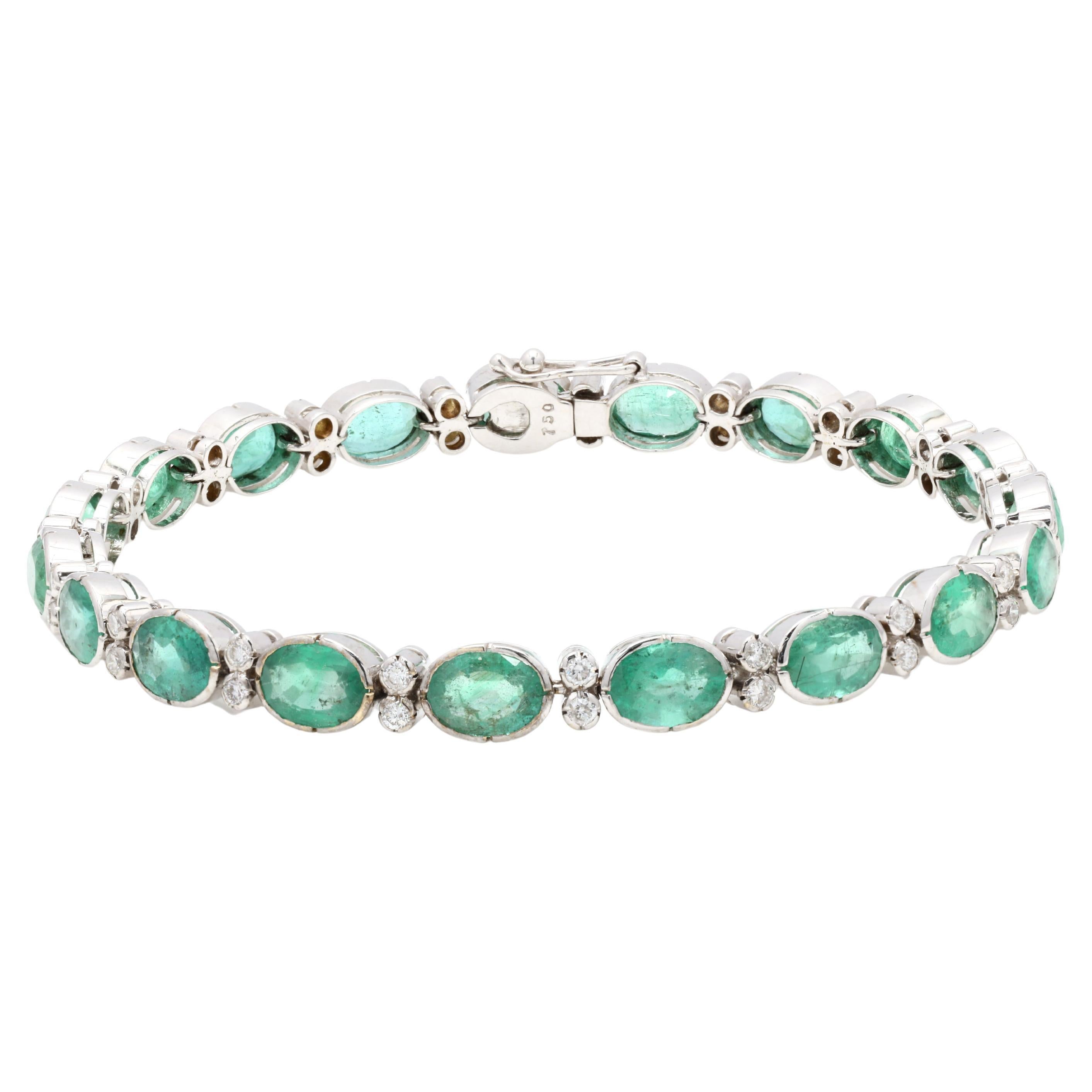 Bracciale tennis con smeraldo alternato a diamanti da 14,15 carati in oro bianco 18 carati