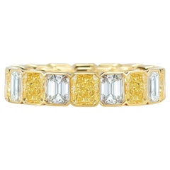 Alternating Fancy Yellow and White Diamond Eternity Band