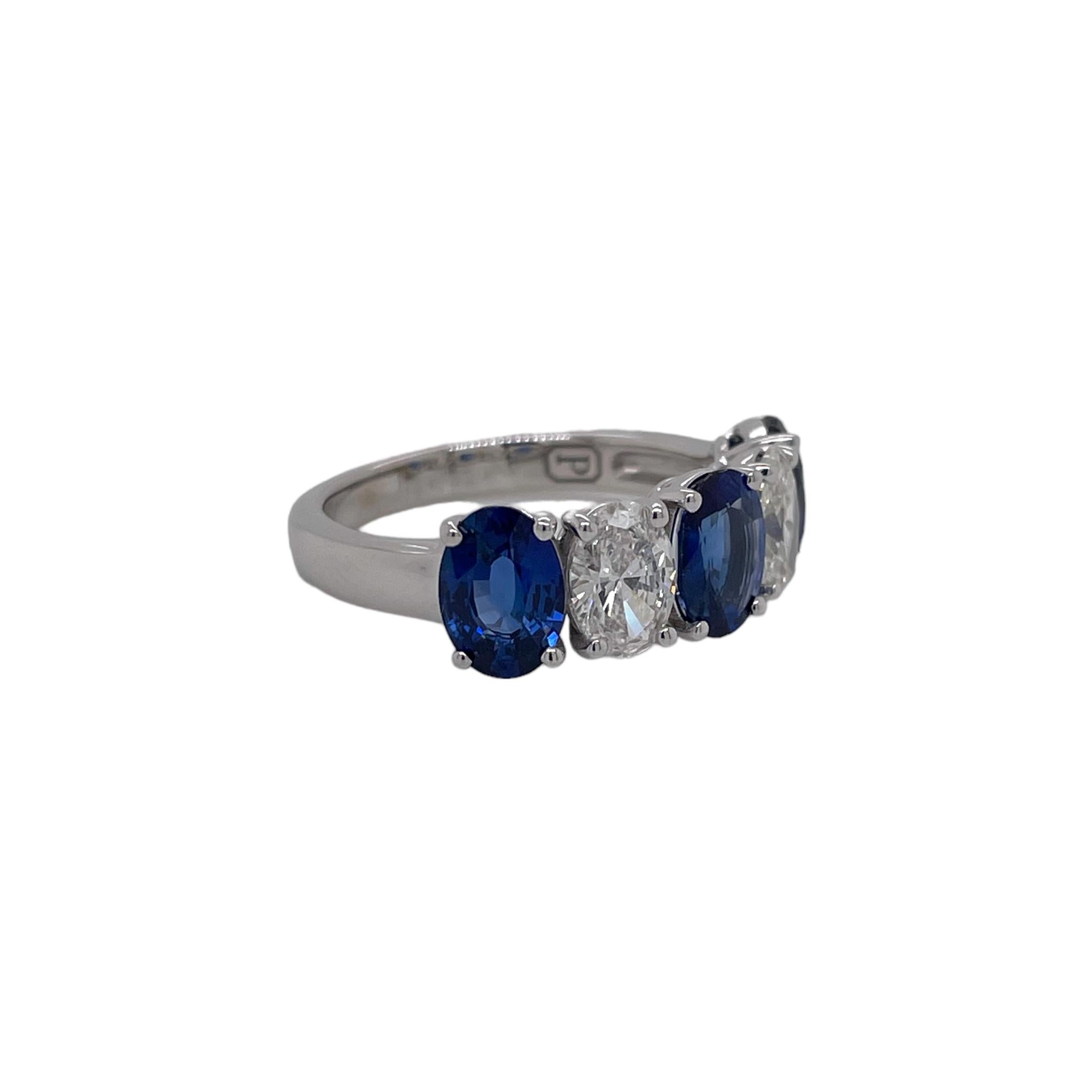 Ring contains 3 oval brilliant sapphires, 2.70tcw and 2 oval brilliant diamonds, 1.03tcw. Diamonds are F in color and VS2 in clarity. All stones are mounted in basket prong settings. Ring is a size 6.75 and can be resized to desired measurement.