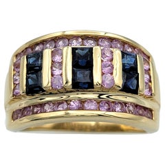 Anillo de oro amarillo de 14 quilates con varias filas de zafiros rosas y azules alternados