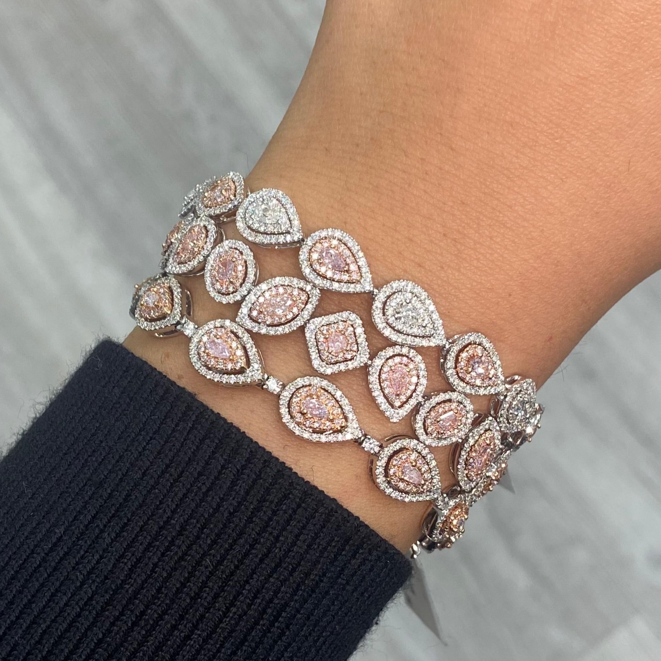 4.68 Carat total weight 
Natural Pink and White pear shapes
F/G color white diamonds 
VS-SI clarity 
Set in 18K White Gold 
7 inches
Exceptional Craftsmanship
Handmade in NYC
At Rare Colors, you can experience the elegance of our exquisite fancy