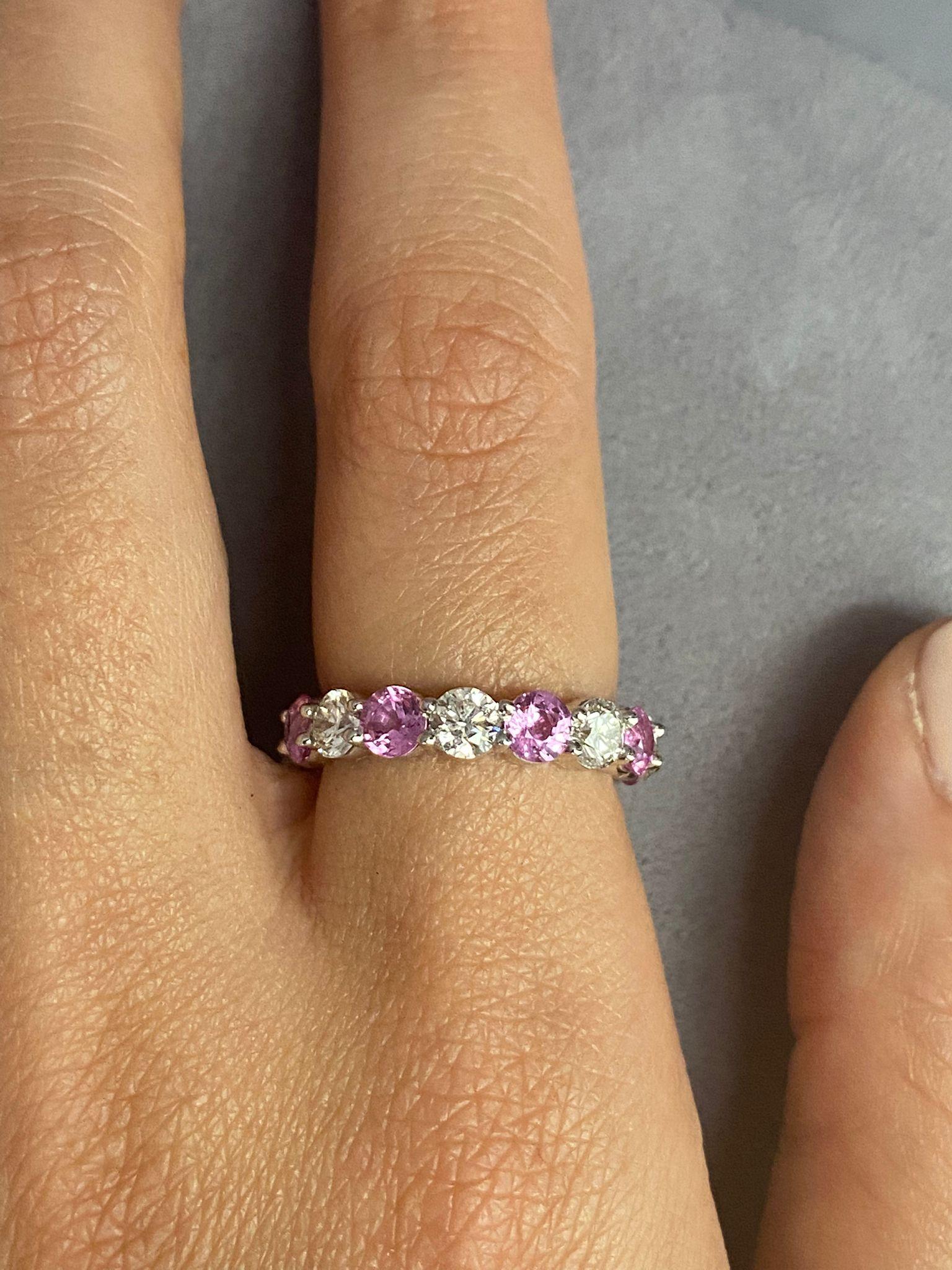 8 Pink Sapphires weighing 2.55 Carats
8 Round Diamonds weighing 1.94 Carats.
Set in Platinum.
Size 6.

Also available in Blue Sapphire, Emeralds and Rubies. Can be ordered in any size.