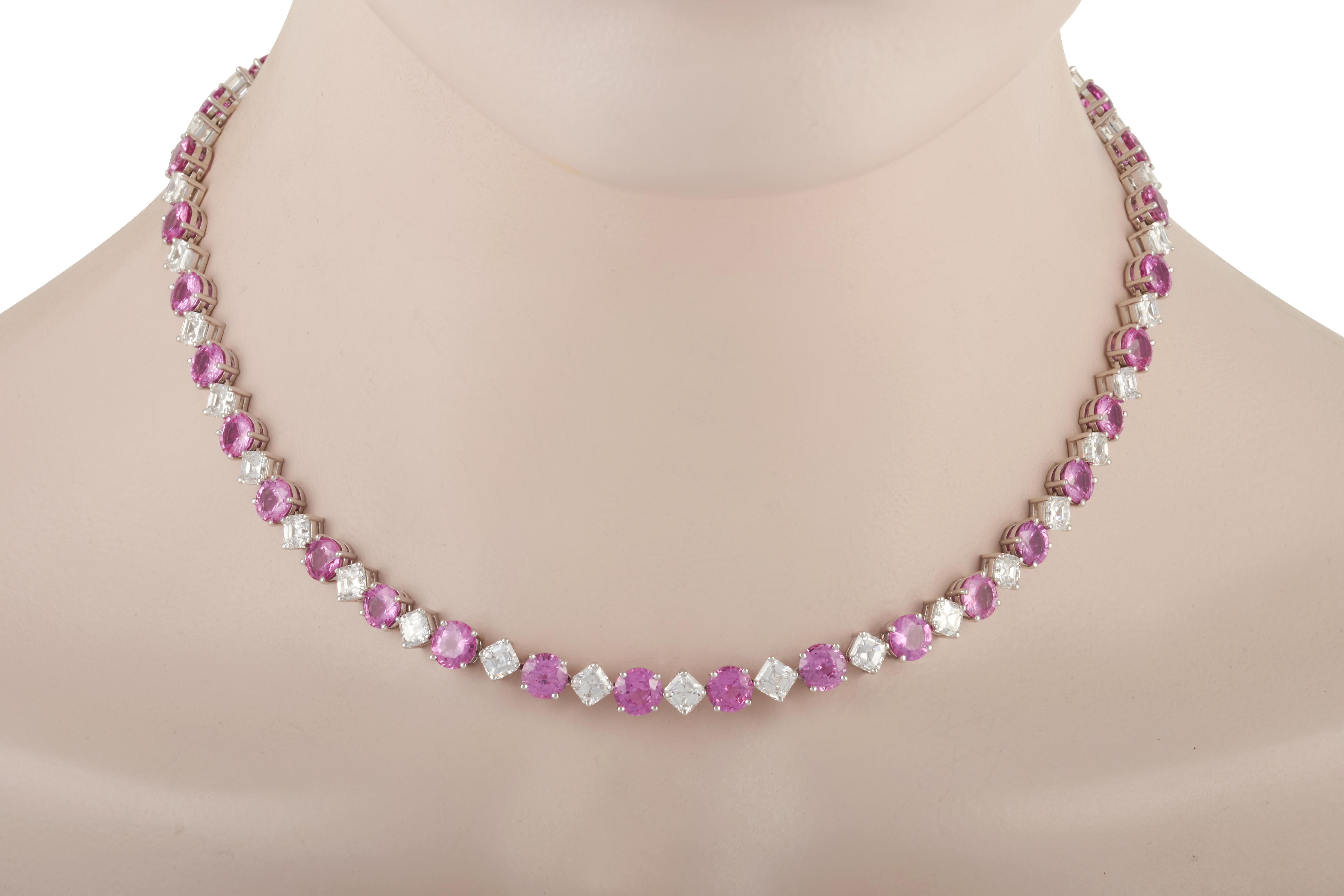 This beautiful estate line necklace features alternating round purple-pink sapphires and square emerald cut diamonds set in platinum, accompanied by a GIA report.  

The 35 round purple-pink sapphires total approximately 42.00 carats, they are