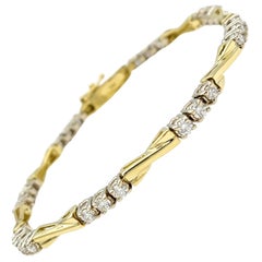 Bracciale con diamanti rotondi alternati e X allungata A Link in oro giallo 18 carati