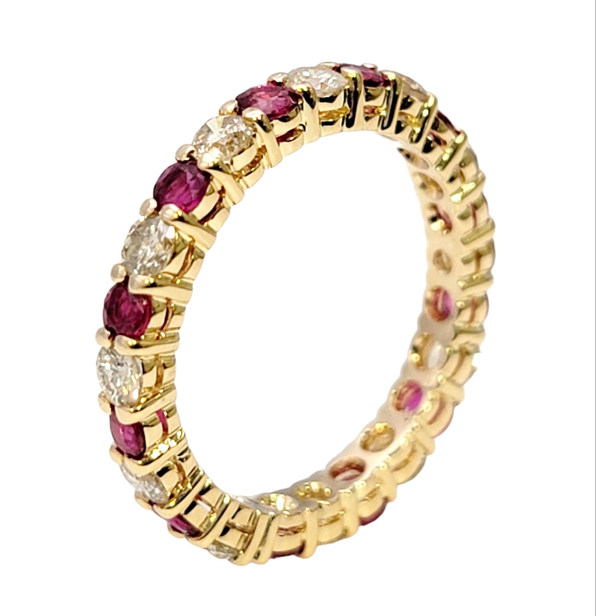 Contemporary Alternating Ruby and Diamond Eternity Band Ring in 14 Karat Yellow Gold Size 6 For Sale