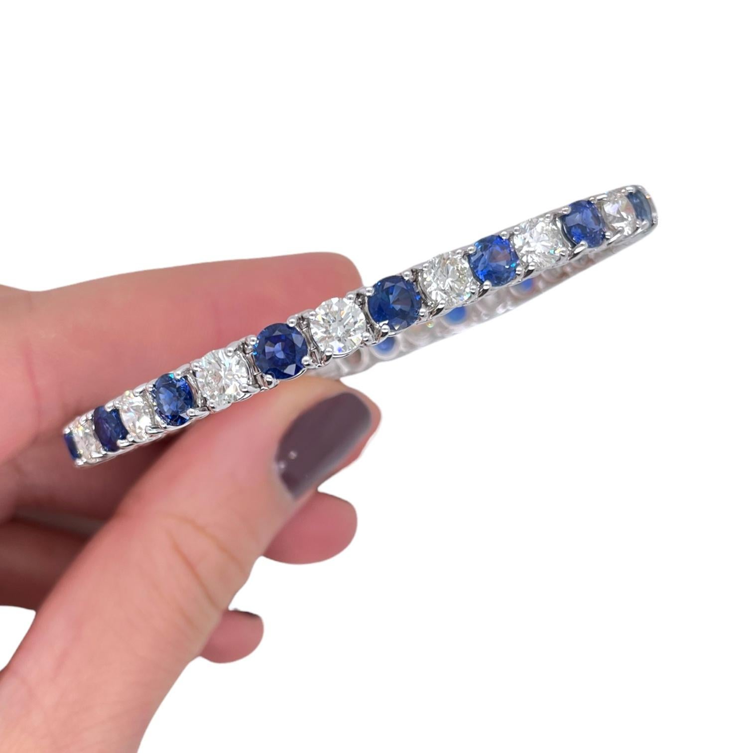 Bracelet contains 18 finely matched round brilliant sapphires, 8.36tcw cw and 18 round brilliant diamonds, 6.82tcw.  Diamonds are near colorless and VS2 in clarity, excellent cut. All stones are mounted in a handmade basket prong setting. Bracelet