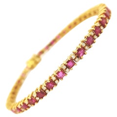 Alternating Square Red Ruby and Diamond Tennis Bracelet in 18K Yellow Gold