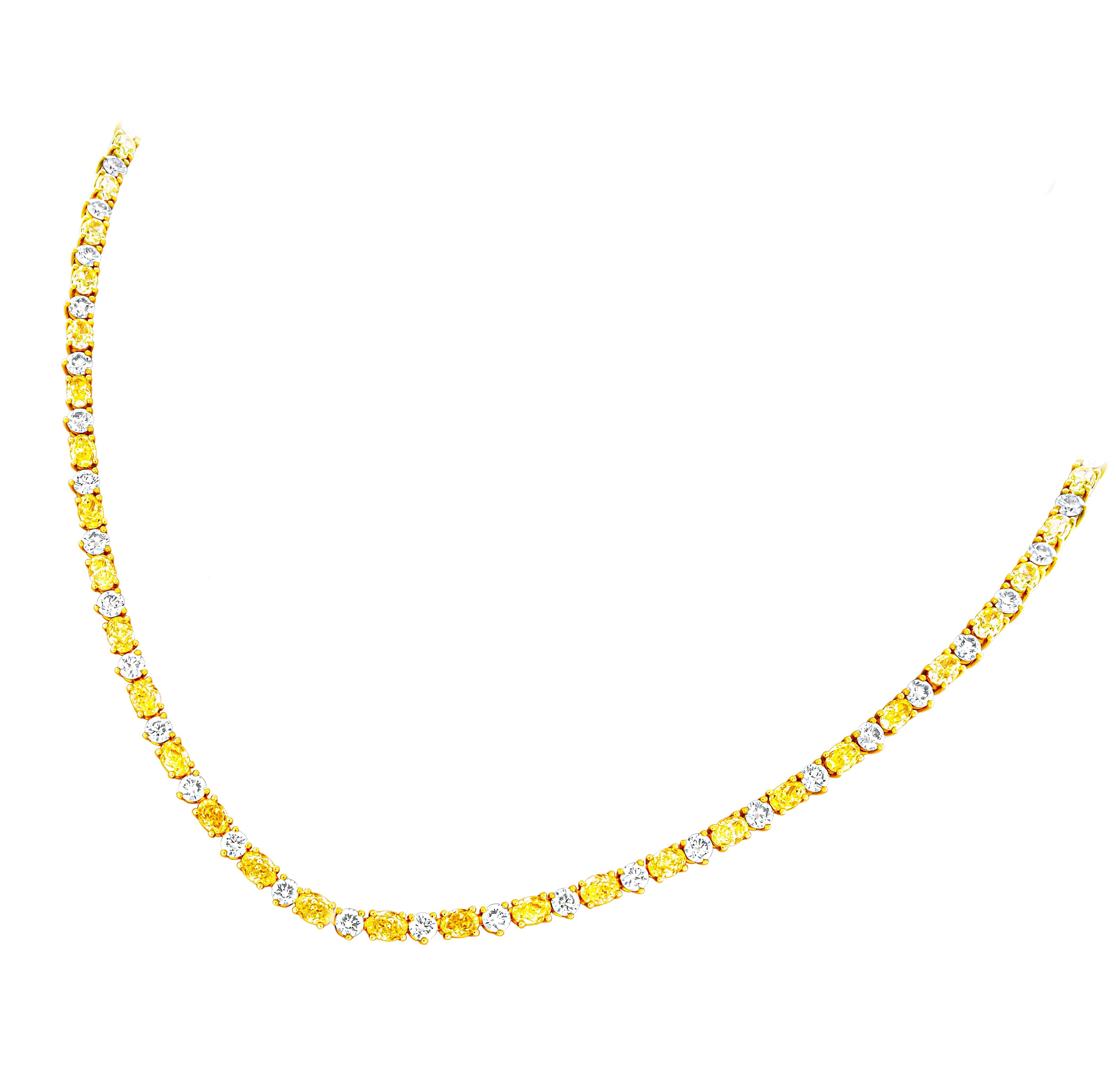 Collana Tennis alternata in YG 18 carati con diamanti ovali e rotondi In oro giallo 18 carati Diamanti ovali Fancy Yellow 53 pietre per un totale di 10,60 carati.  0,20ct Ciascuno 
Diamanti rotondi, colore F/G e purezza VS 53 pietre da 3,0 mm per un