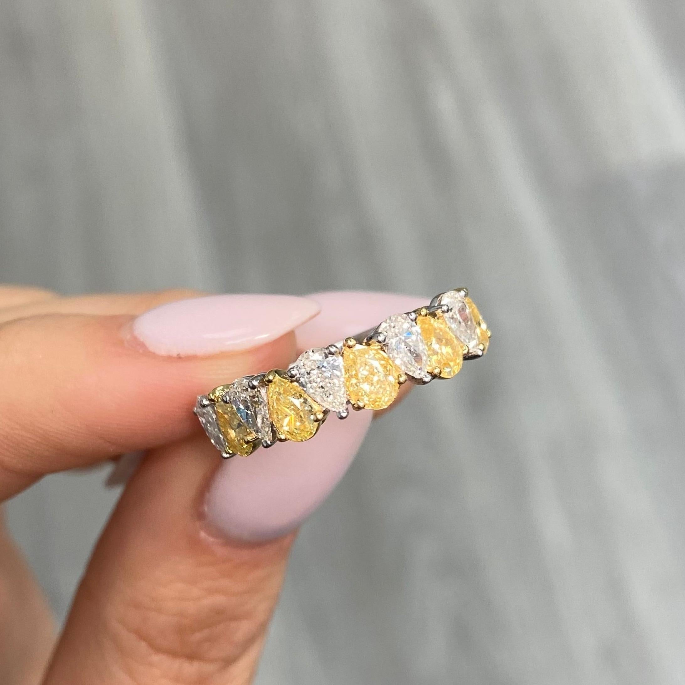 Fancy Yellow Diamonds
VS-VVS Clarity
Pear Shape
3 Carat Total Weight in Photos
10 Diamonds
Set in 18k White Gold
Handmade in NYC
Ready to Ship in 3-4 weeks 

Making Extraordinary Attainable with Rare Colors
