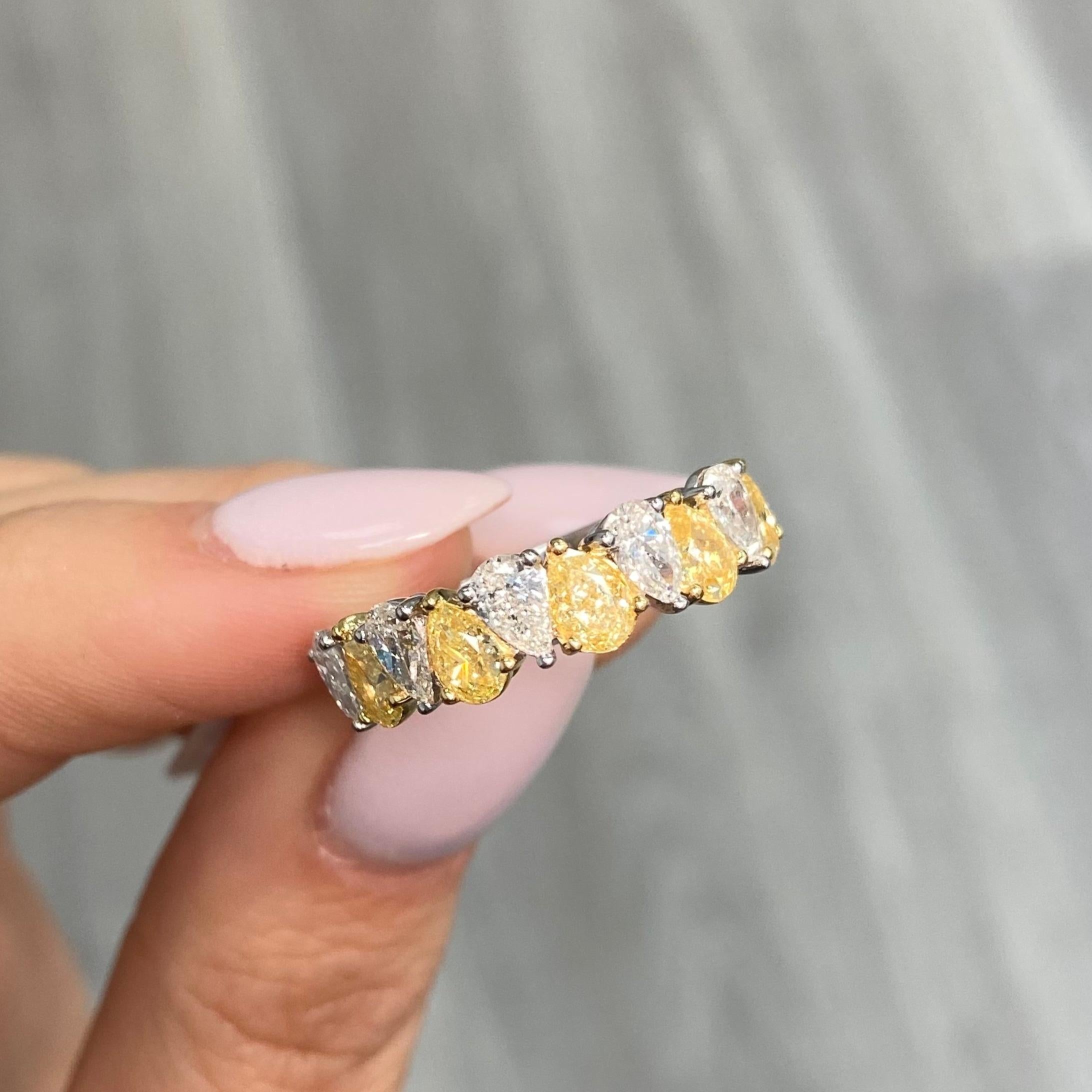 3 Carat Total Weight in the photos. Larger and smaller sizes are available and are made to order.
Fancy Yellow Diamonds and Colorless (G color)
VS-VVS Clarity
Pear Shape
10 Diamonds
Crafted in 18k White Gold
Handmade in NYC
At Rare Colors, you can