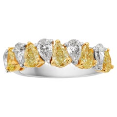 Anillo de media eternidad de diamantes amarillos en forma de pera alternados