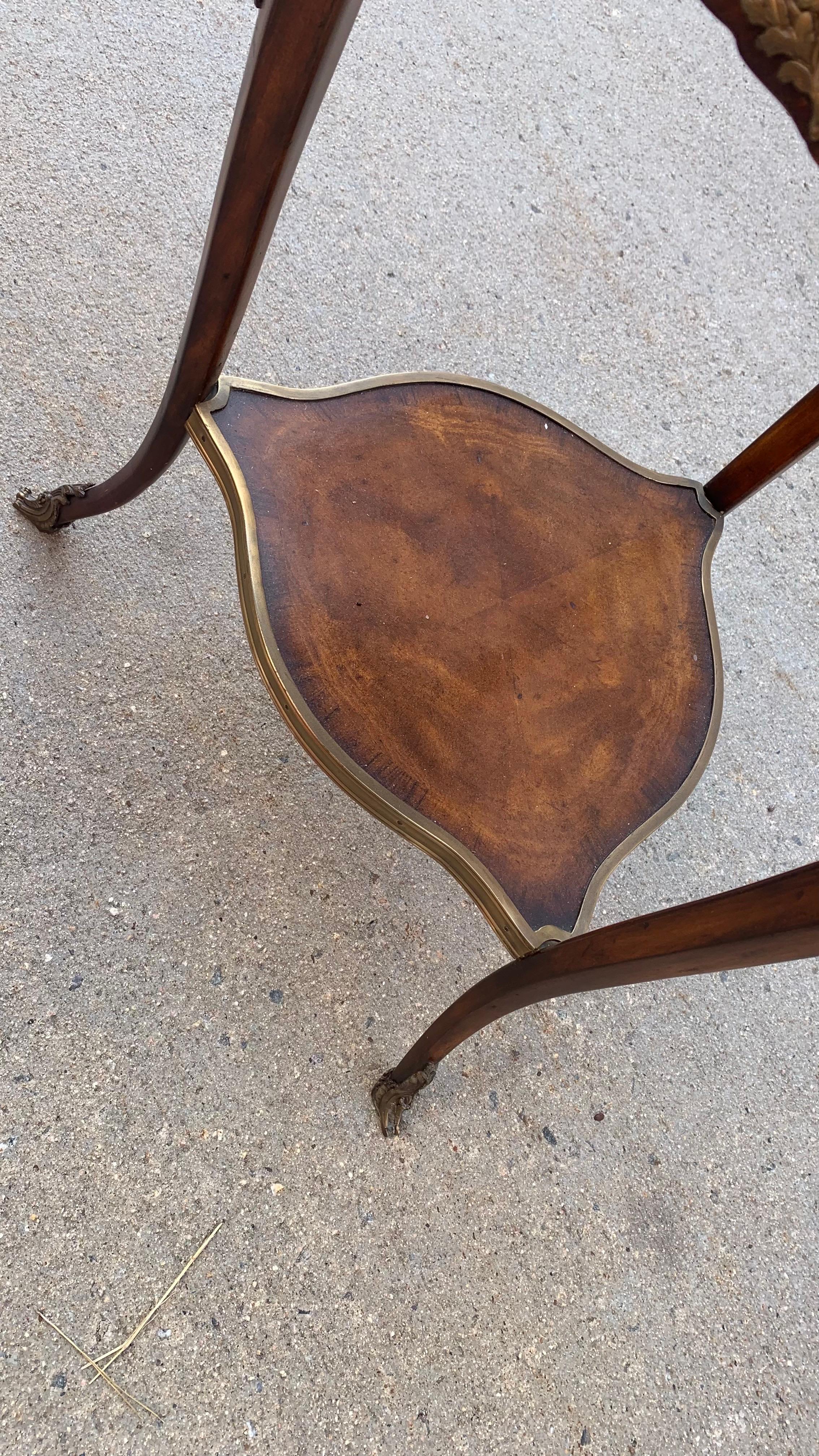 Model number: AL50065
Has the Althorp emblem in the drawer as well as the signature by Charles Spencer (the owner of the company).

From the catalog:
“A Louis XV mahogany and ormolu mounted occasional table, the brass bound shaped circular top above