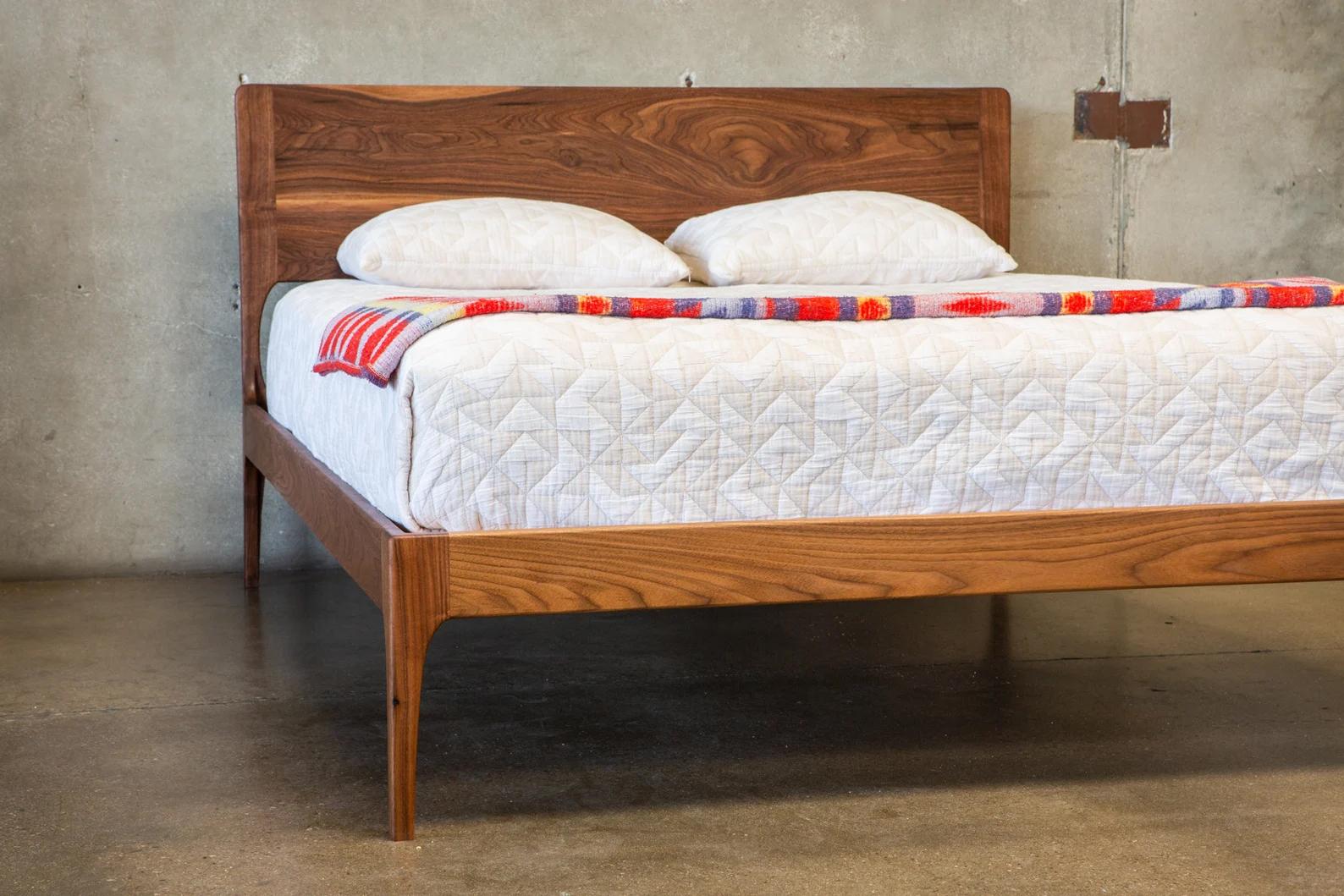 The Alto Bed takes it's cues from my Classic Modern Design, with the same simple, continuous lines. But the legs are brought in line with the frame, making for a more compact footprint. This bed can be built in any size and in any species of wood,