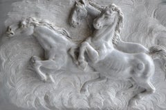 High relief of running horses carved on Italian Bardiglio marble
