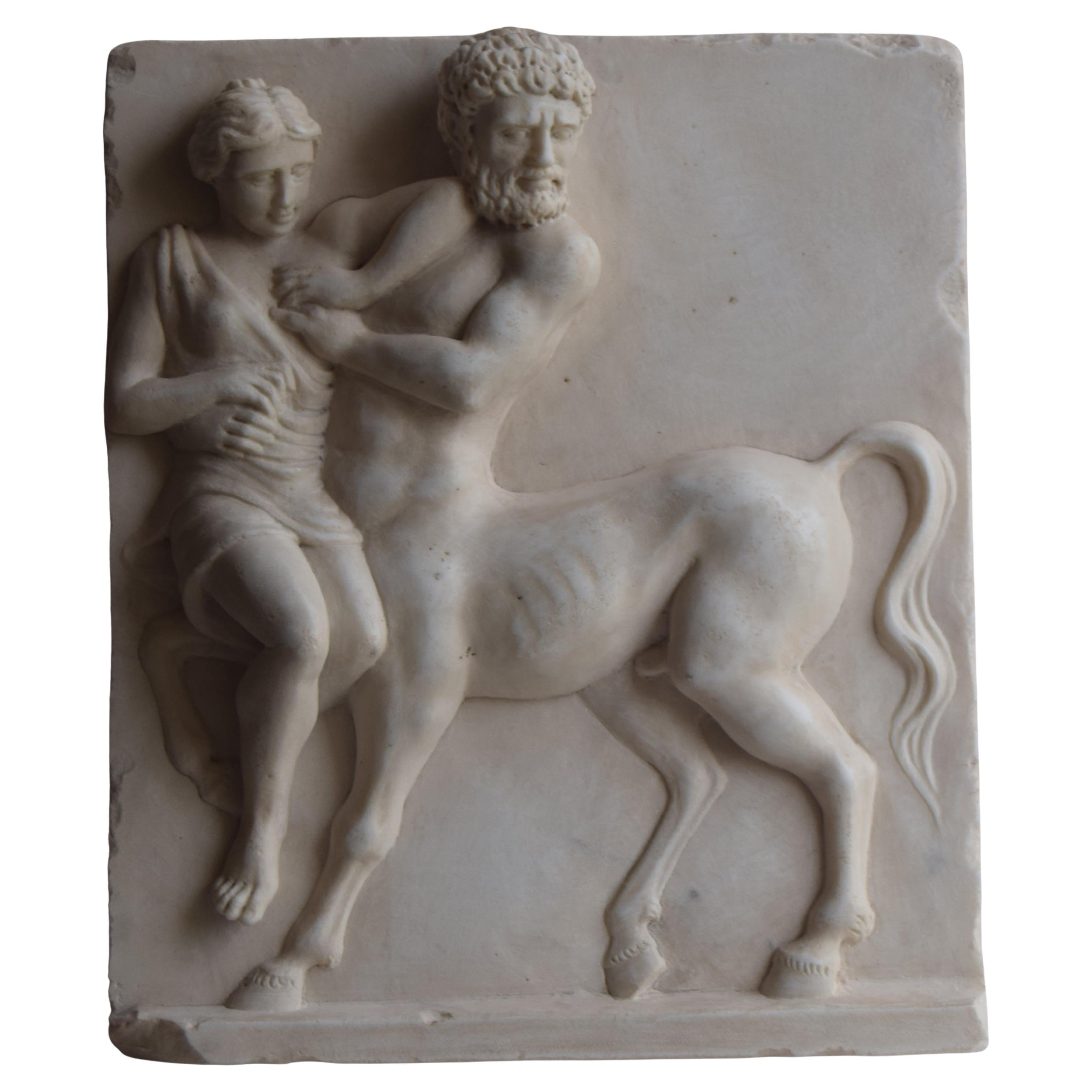 Altorrelieve -Violación del centauro Euritión por Hipodamia -mármol blanco de Carrara