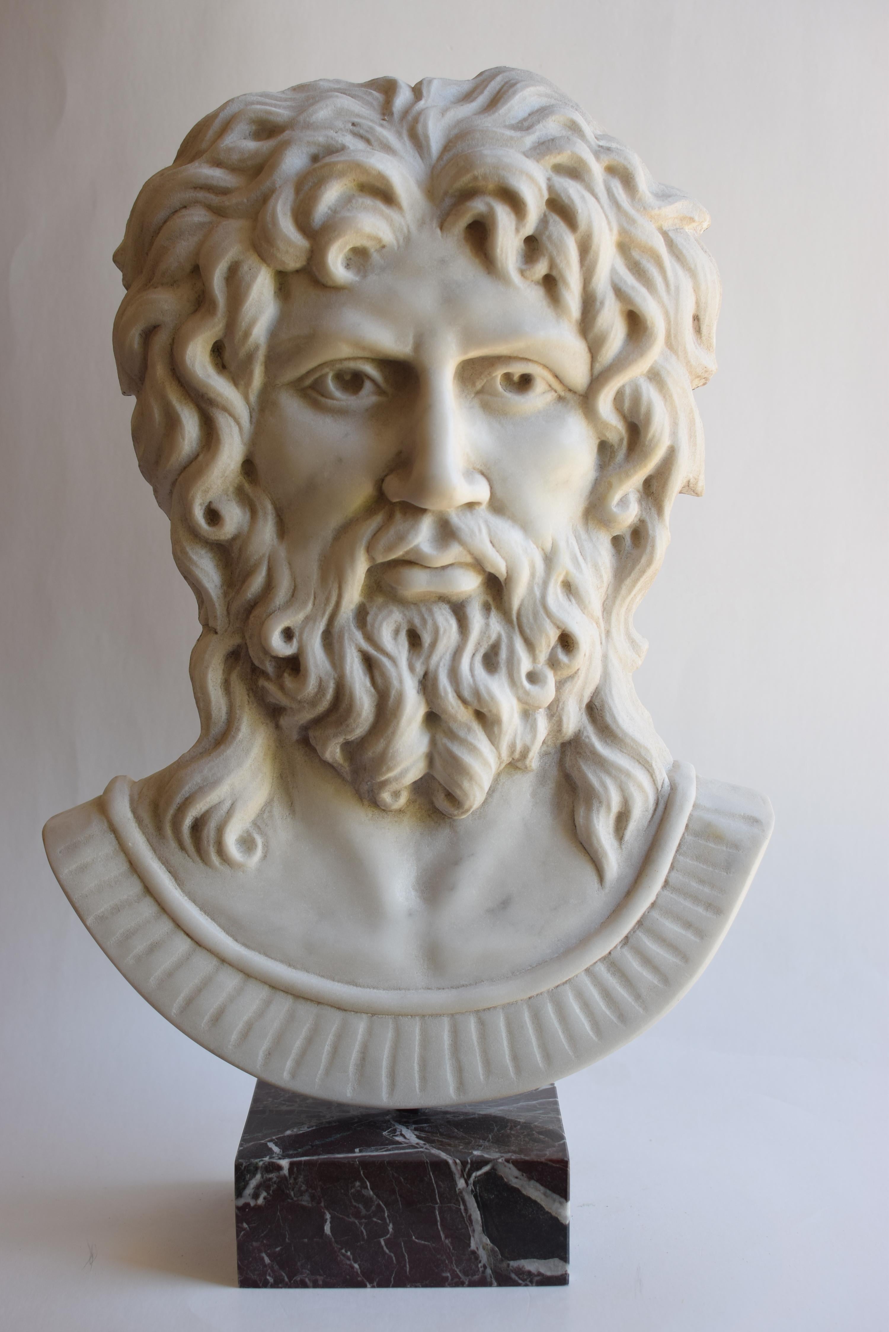 Zeus high relief, Jupiter marble, Zeus marble head, Zeus altemps sculpture, Zeus marble, Jupiter Carrara marble.
Beautiful high relief sculpture of a Head of Zeus, made of white Carrara marble placed on a base of red Levanzo marble
Modello originale
