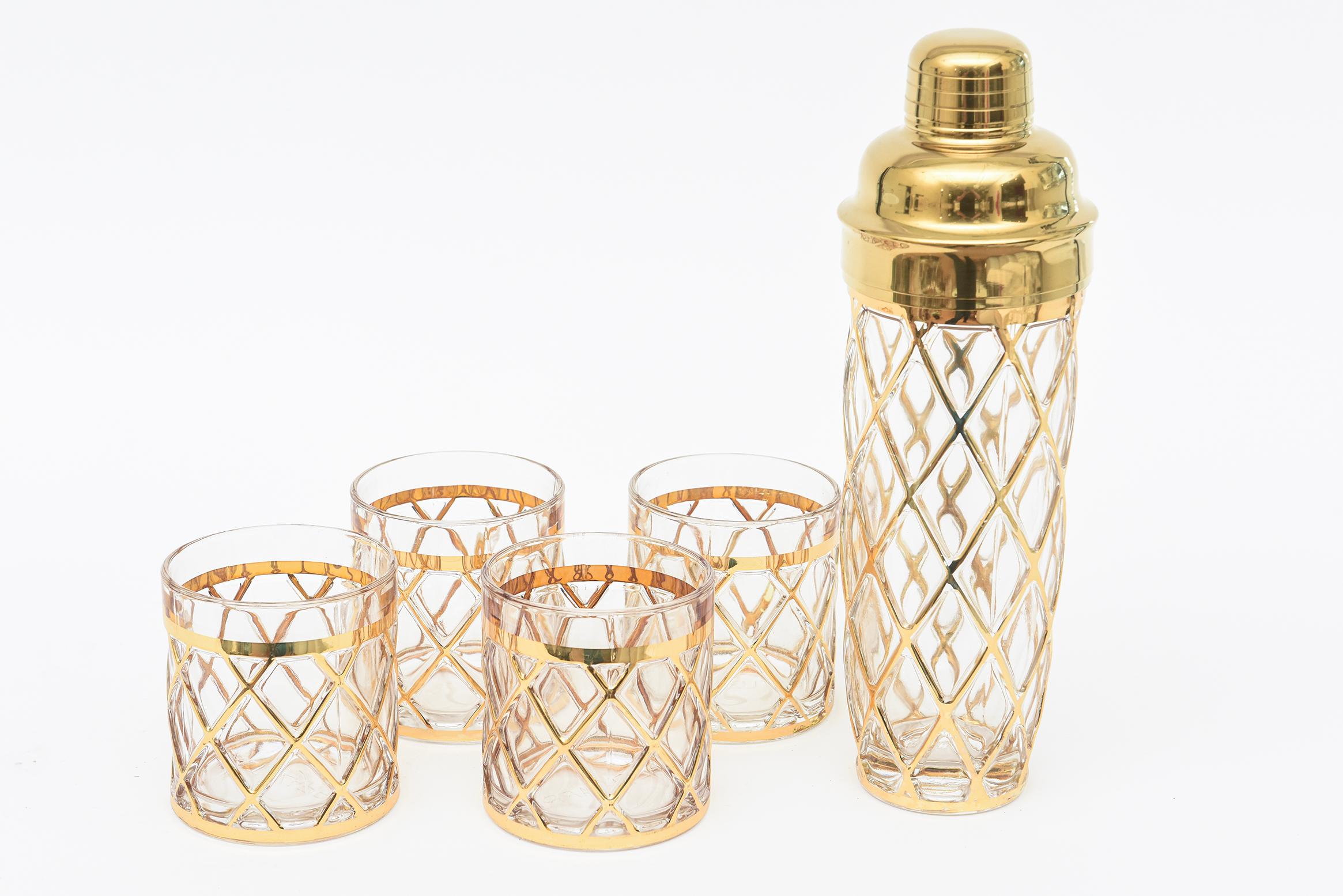 This ever so glam cocktail shaker and 4 rock glasses is a true fit for your barware. Designed and signed by the noted fashion designer Altuzarra it is 18K gold plated over glass in a diamond pattern. Joseph Altuzarra started and launched his brand