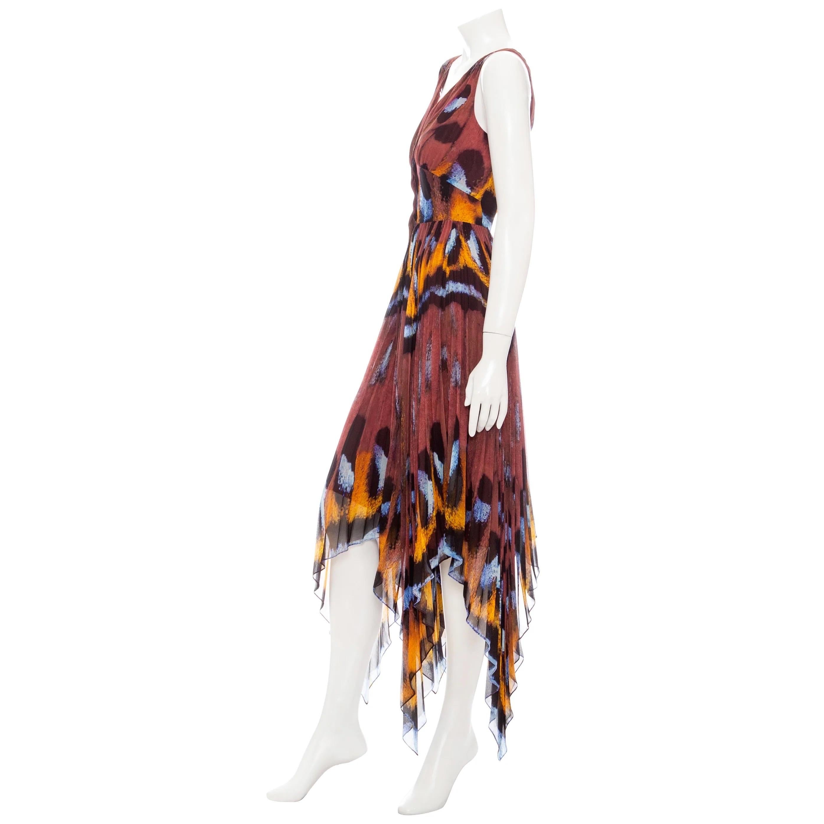Altuzarra Annabella Butterfly Print Sleeveless Handkerchief Dress

Brown/Blue/Orange/Black
Abstract butterfly print
Sleeveless
V-neckline
Empire bust
Shirred skirt
Handkerchief hem
Concealed front button closure
Made in Italy
Great preowned