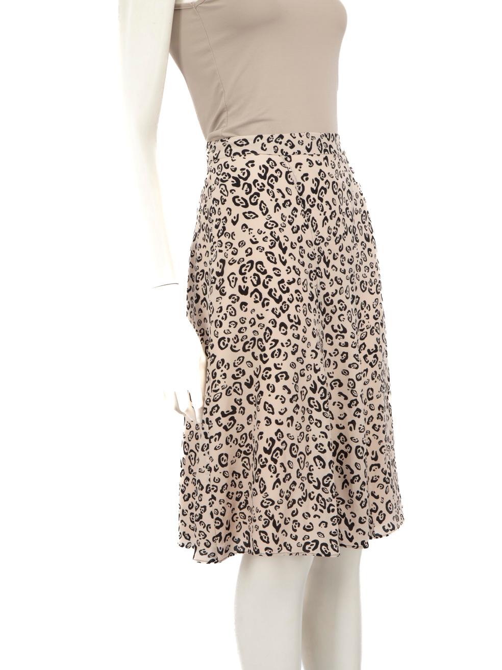 CONDITION is Very good. Hardly any visible wear to the skirt is evident on this used Altuzarra designer resale item.
  
  
  
  Details
  
  
  Beige
  
  Silk
  
  Skirt
  
  Leopard print
  
  Midi
  
  Flared hem
  
  Back zip and hook fastening
