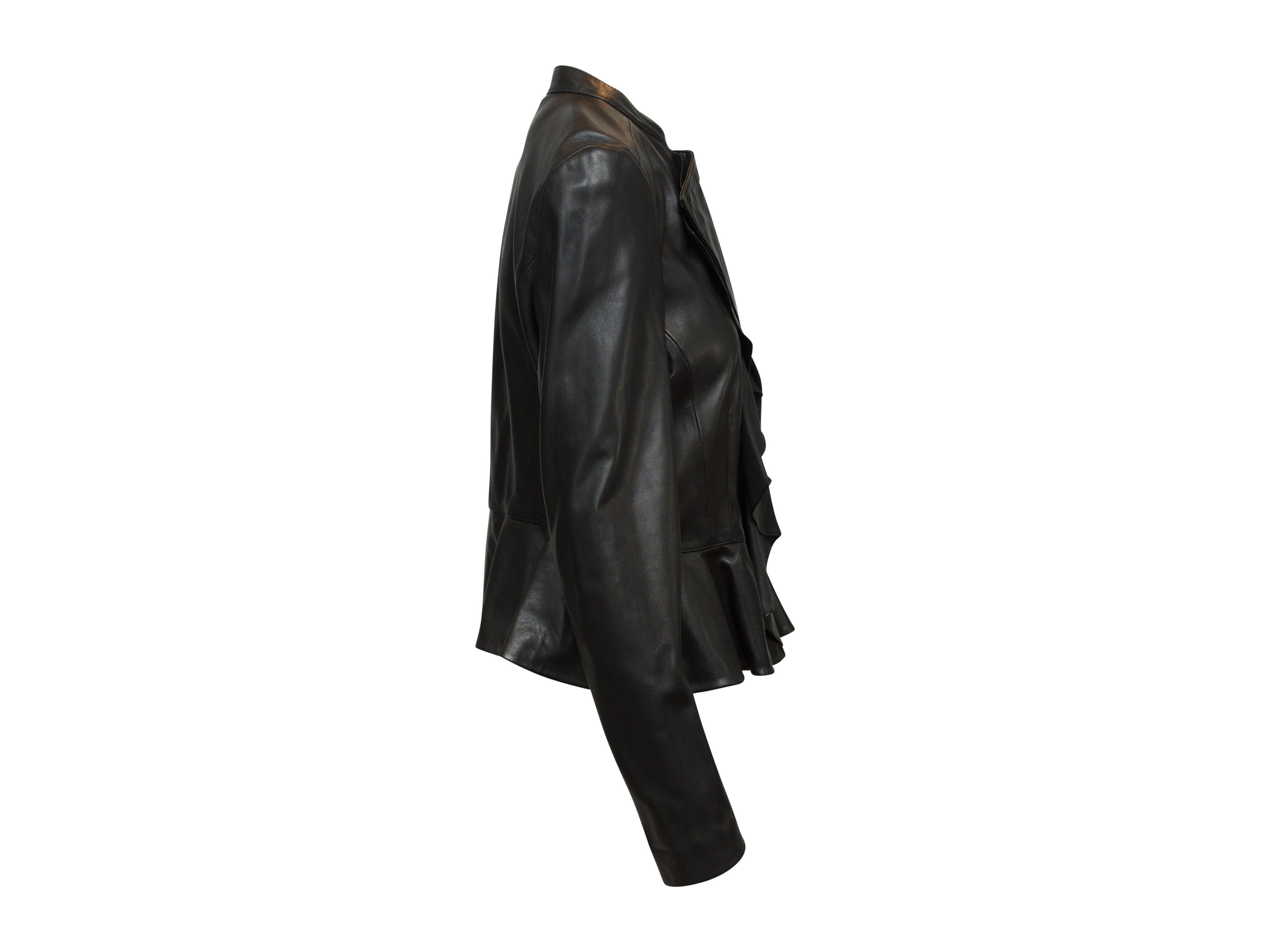 Product details: Black leather fitted jacket by Altuzarra. Crew neck. Ruffle trim. Zip closure at front. Designer size 42. 32