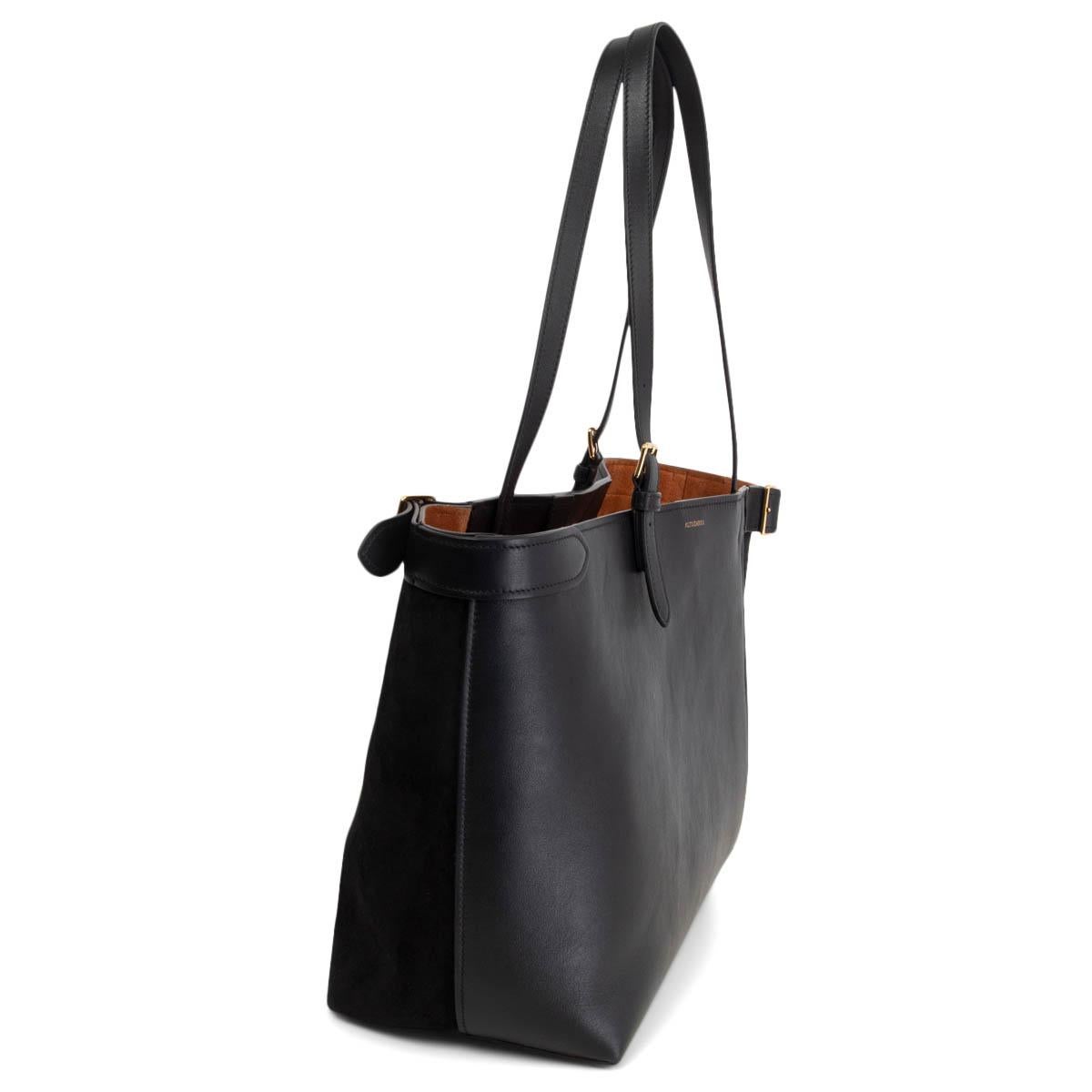 100% authentic Altuzarra Play tote bag is made from black leather and suede with gold-tone metal buckles. Lined in pumpkin suede with one big zipper pocket against the back. Brand new. Comes with dust bag. 

Measurements
Height	29cm