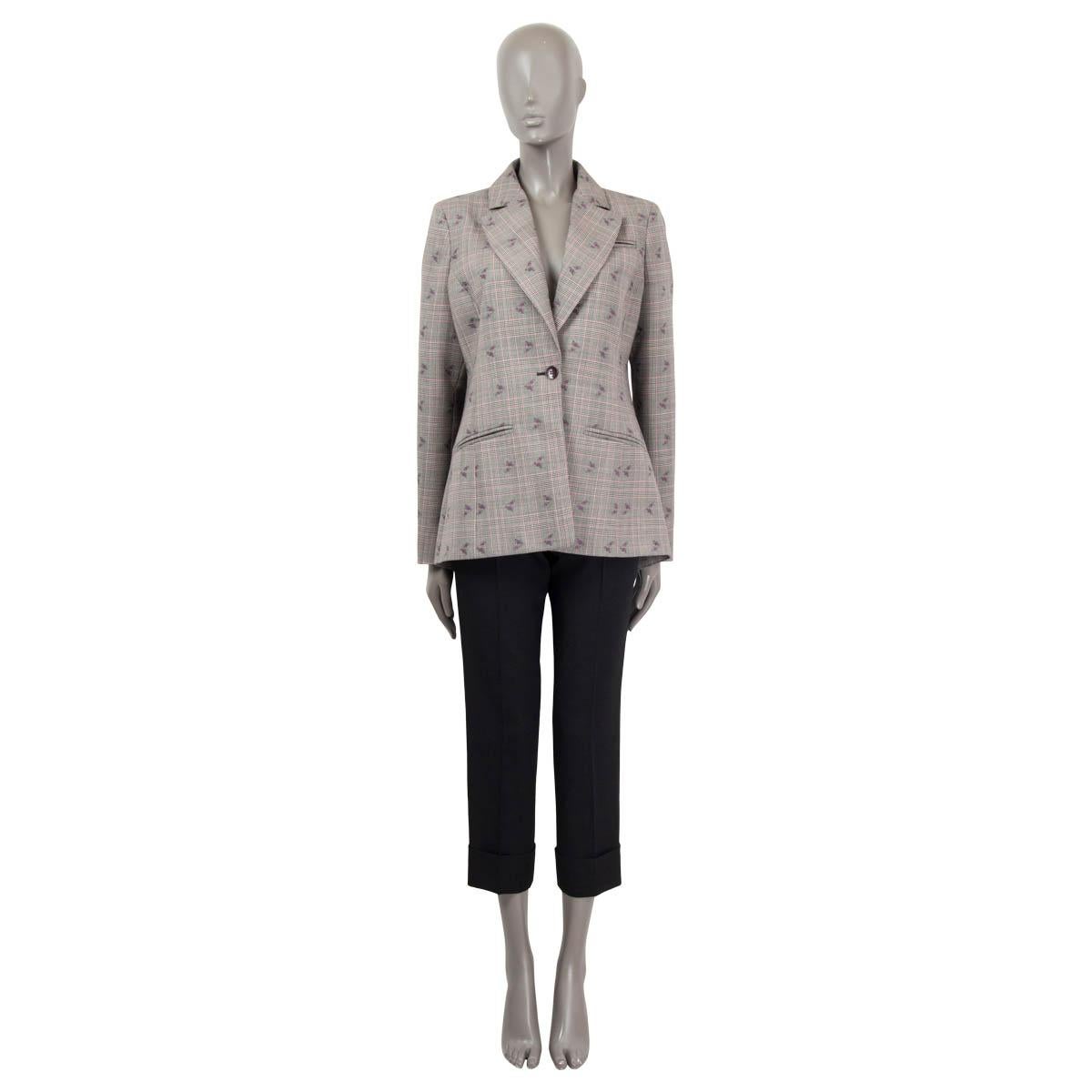 100% authentic Altuzarra floral-embroidered prince of wales blazer in gray, black, and purple wool (90%), cotton (9%) and elastane (1%). Opens with one button. Features a two front slit pockets, one chest pocket and a box pleat at the back. Lined in