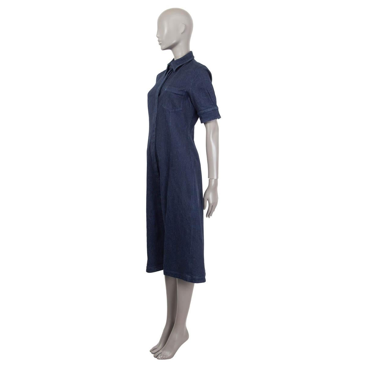 100% authentic Altuzarra 'Kieran' denim shirt dress in berry blue cotton (98%) and elastane (2%). Features a patch pocket and a slit on the front. Opens with eleven buttons on the front. Semi-lined in navy polyester (100%). Detachable belt is