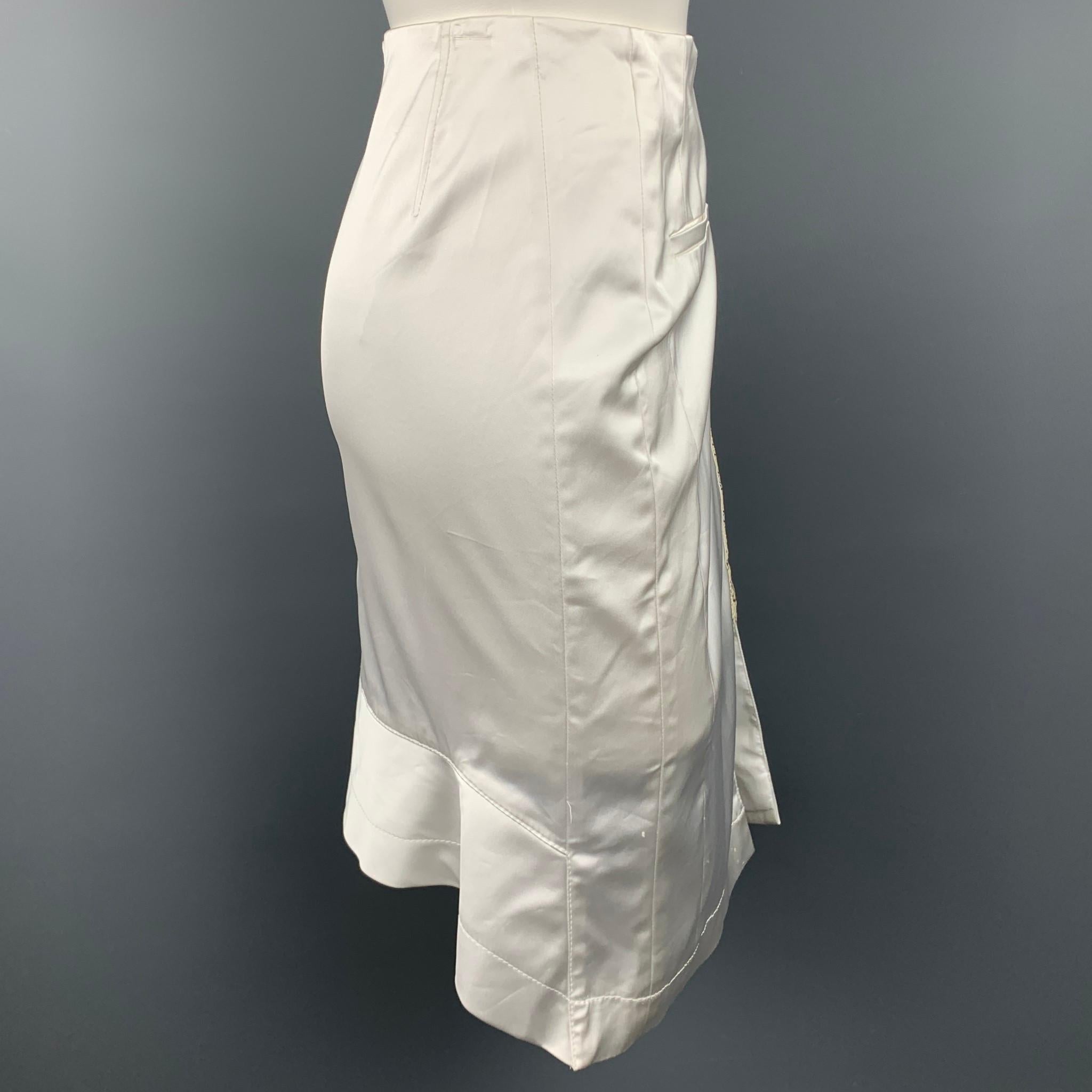 ALTUZARRA skirt comes in a white satin acetate blend with a snake skin trim featuring a pencil style and a back zip up closure. Minor discoloration. As-Is. Made in Italy.

Good Pre-Owned Condition.
Marked: 10

Measurements:

Waist: 33 in. 
Hip: 42