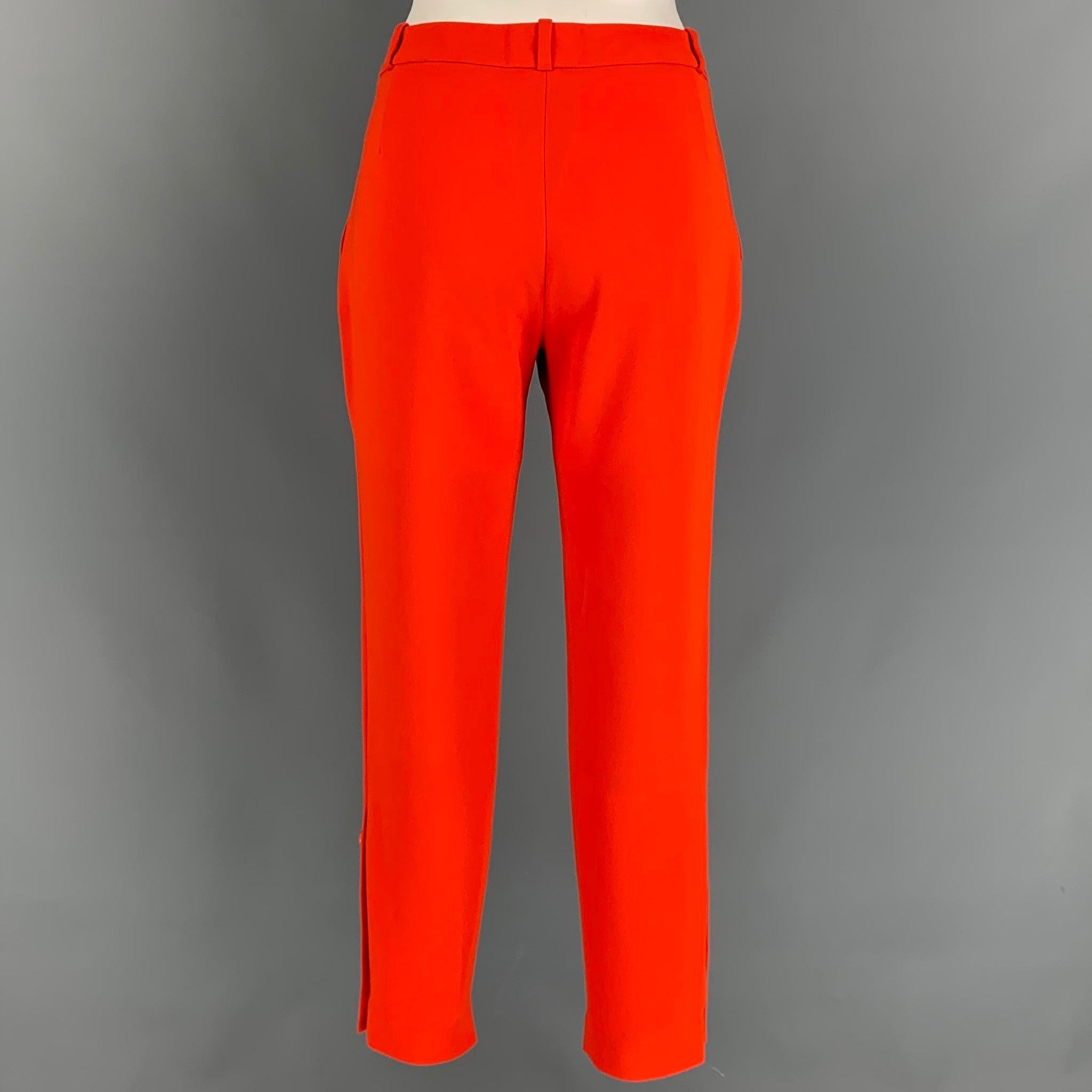 ALTUZARRA dress pants comes in a orange triacetate featuring a narrow leg, buttoned details, front tab, and a zip fly closure. Made in Italy.
Very Good
Pre-Owned Condition. 

Marked:   40 

Measurements: 
  Waist: 32 inches  Rise: 9 inches  Inseam: