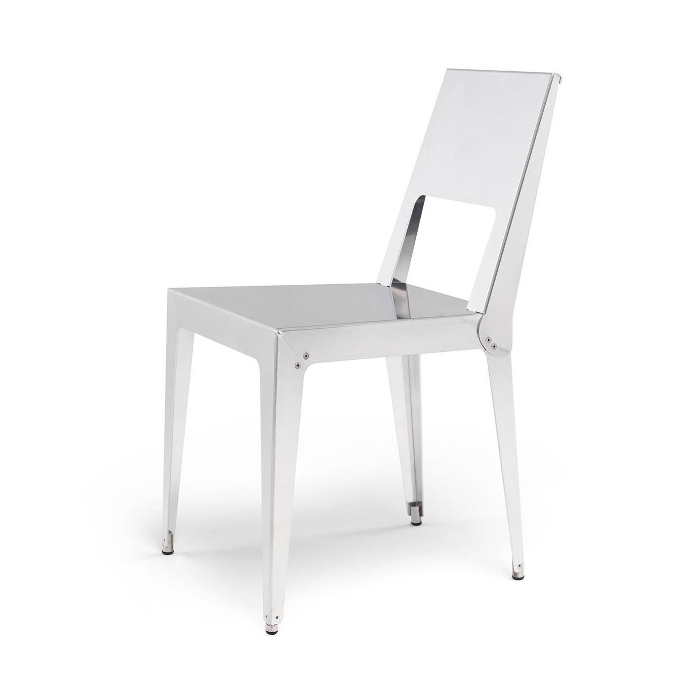 This charming set of two chairs will be a precious addition to a contemporary and modern home. Reinterpreting the simple lines of a Minimalist chair, its body is created by mechanically joining two folded sheets of aluminium without any welding. The