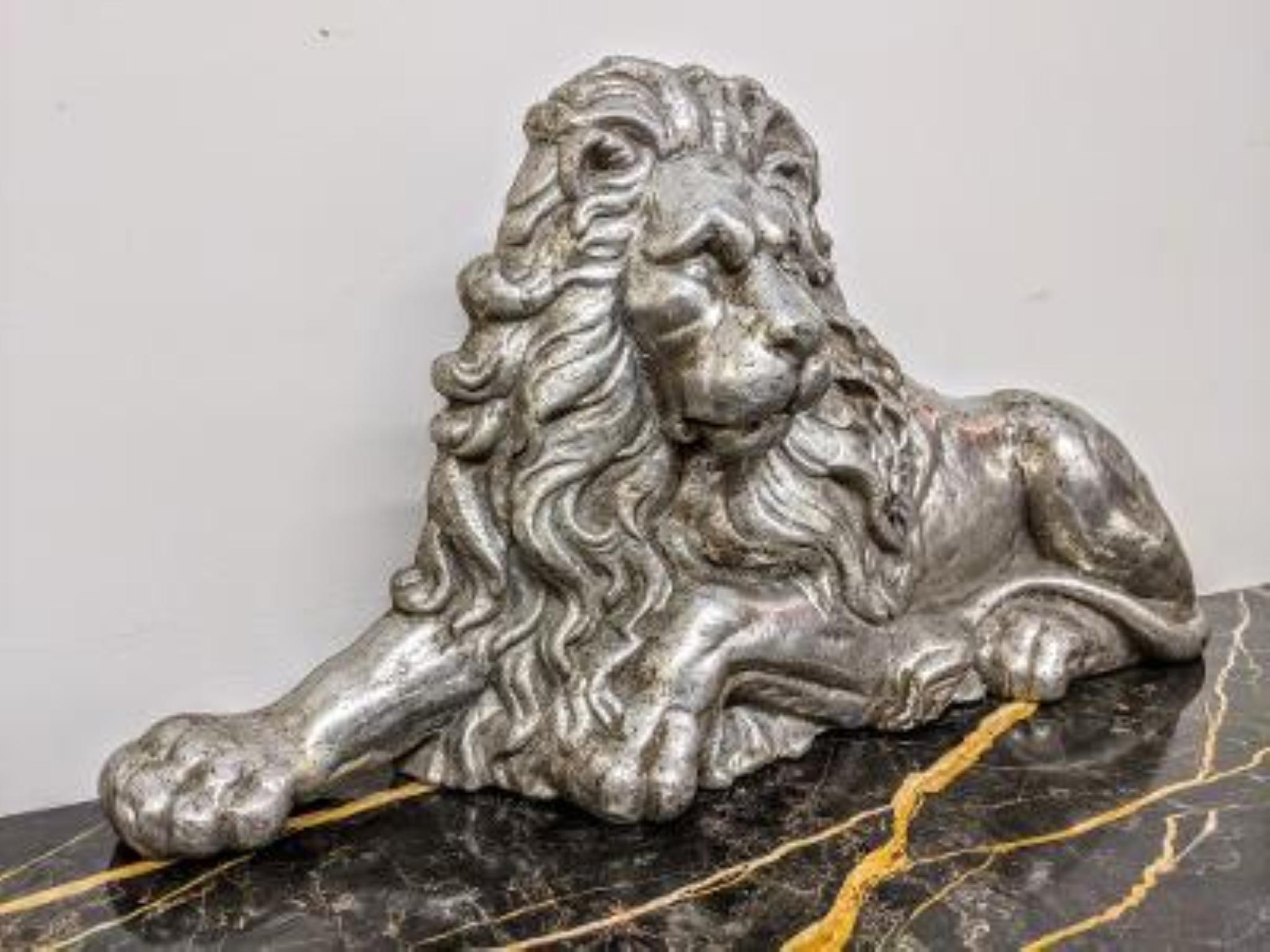A French Art Deco aluminum lion sculpture. Plating in different finishes upon request. We are the rare source that has specialized in French Art Deco for over three decades, since 1991 with restoration, repair and plaiting for any lighting period.