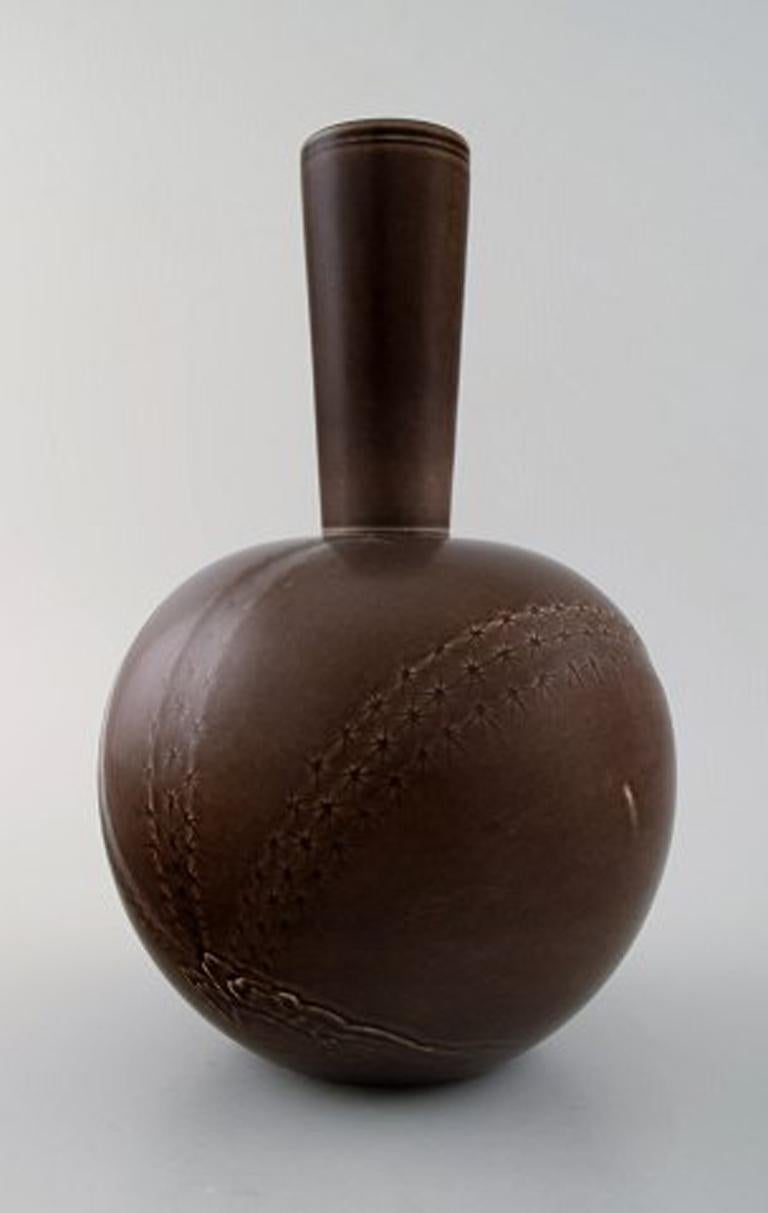 Aluminia, Copenhagen, faience vase, brown glaze, circa 1940s.
Measures 24 x 15 cm.
In perfect condition.
1st. factory quality.
Stamped.