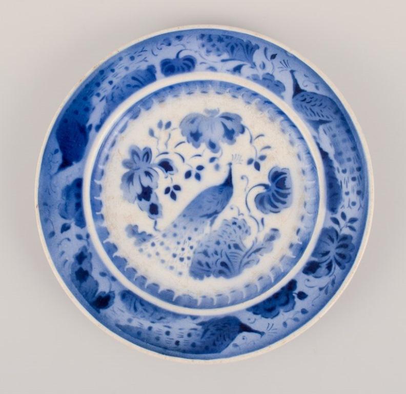 Aluminia, Denmark. Oval dish and two plates in faience. Peacock pattern. In Good Condition For Sale In Copenhagen, DK