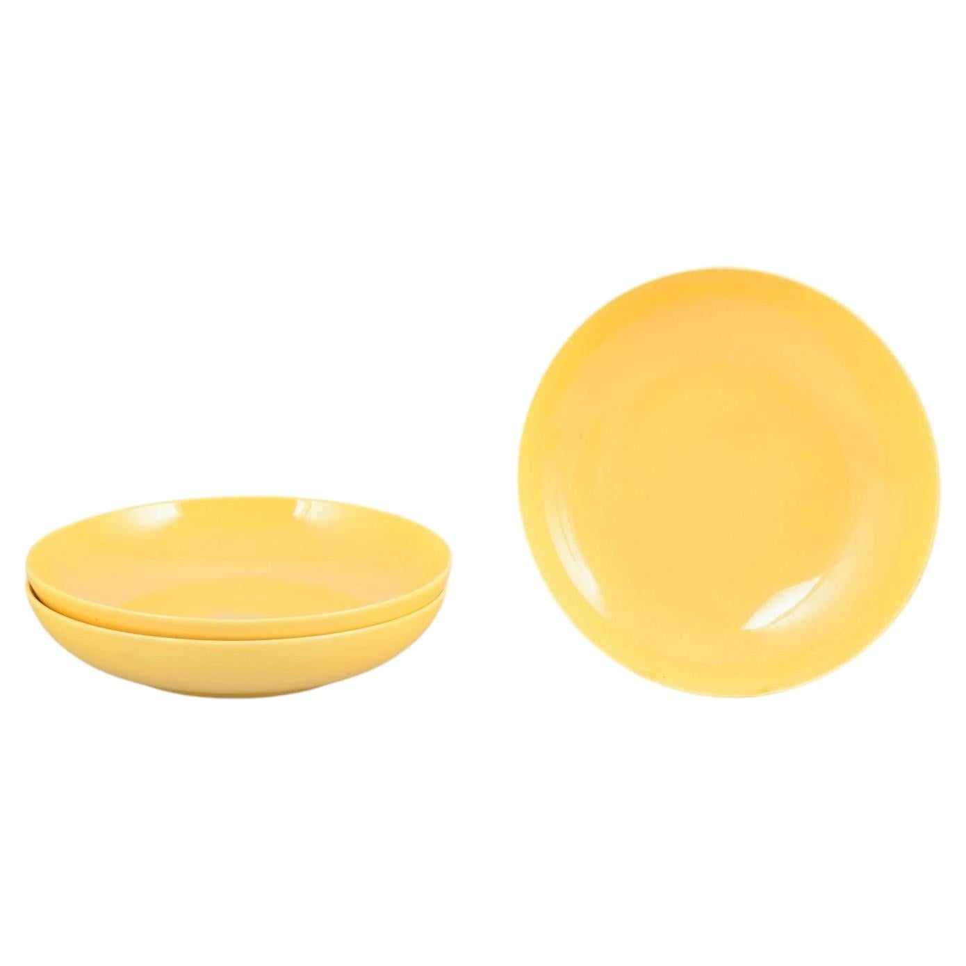 Aluminia. Set of three large deep faience plates. "Confetti" series, mid-20th C.