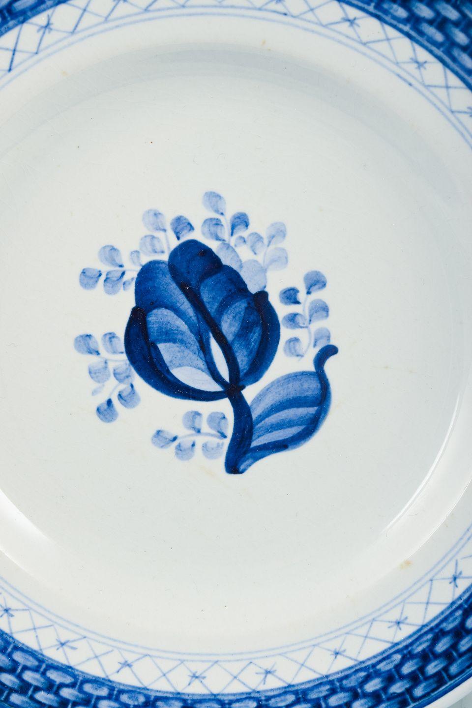 Danois Aluminia, Tranquebar. 14 plaques en faïence à décor bleu. en vente