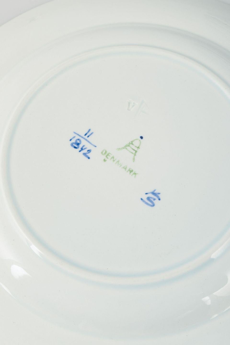 Vernissé Aluminia, Tranquebar. 14 plaques en faïence à décor bleu. Milieu du 20e siècle. en vente