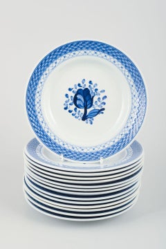 Aluminia, Tranquebar. 14 plaques en faïence à décor bleu. Milieu du 20e siècle.