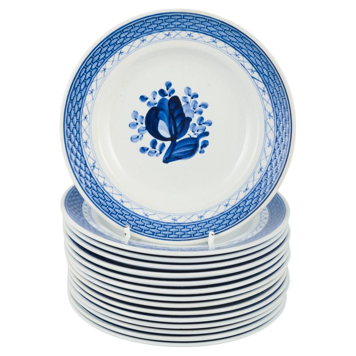 Aluminia, Tranquebar. 15 assiettes en faïence à décor bleu.Mid-20th C.
