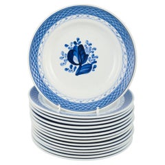 Aluminia, Tranquebar. 15 assiettes en faïence à décor bleu.Mid-20th C.