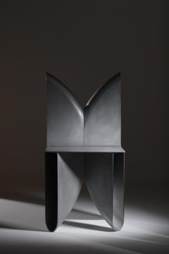 Aluminium cast grey architectural bb chair