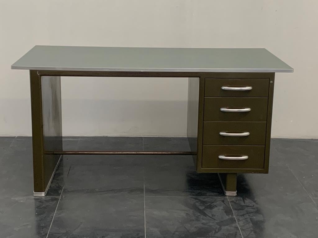 Desk in painted aluminium with laminate top from Carlotti.
Packaging with bubble wrap and cardboard boxes is included. If the wooden packaging is needed (fumigated crates or boxes) for US and International Shipping, it's required a separate cost
