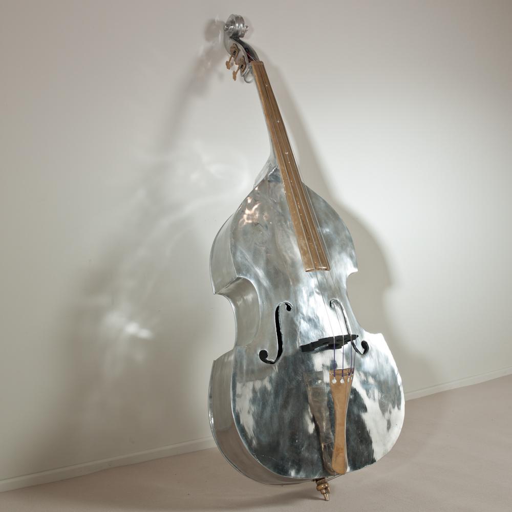 A cast aluminium and bronze double bass by Christian Maas for Talisman signed and stamped 4/8.