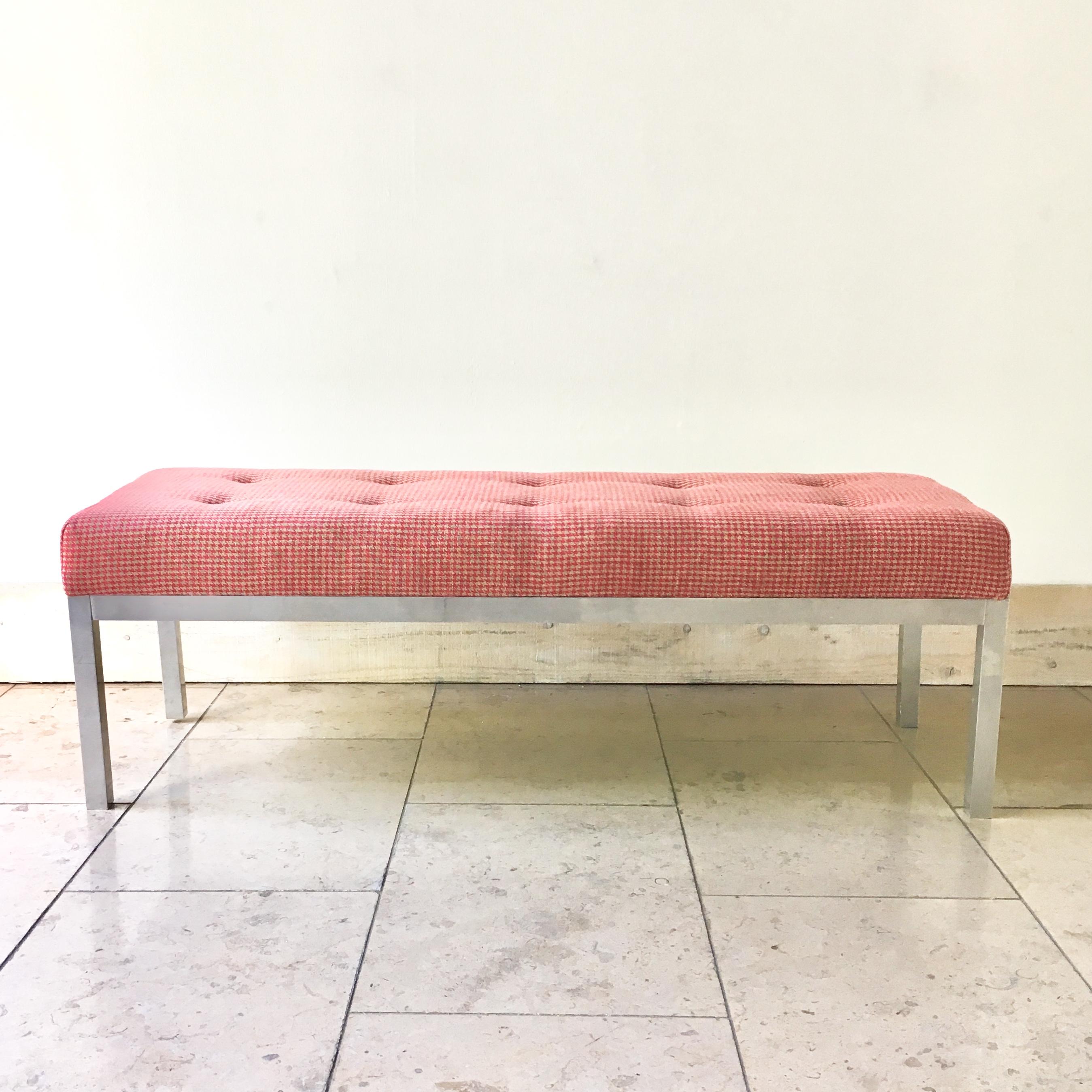 A simple aluminium framed stool upholstered in a buttoned luxurious linen fuchsia pink hounds-tooth, 1960s
