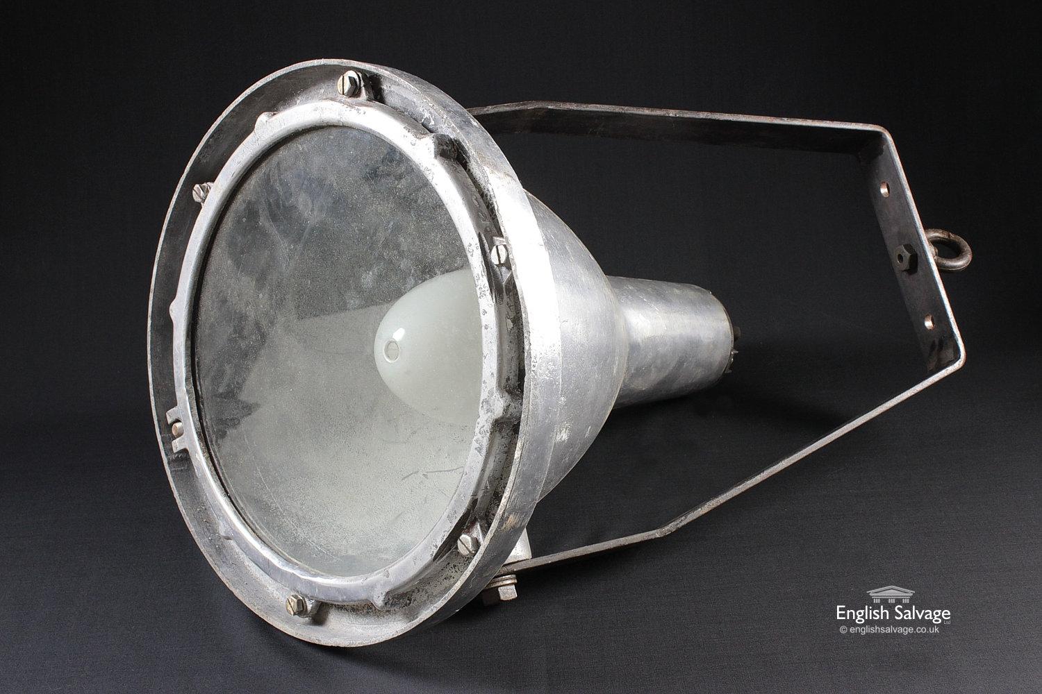 Aluminum conical ship lights/spotlights within a rotating, hanging frame/bracket.

Frame/bracket can be removed.

All electrical work/installation must be undertaken by a qualified electrician.